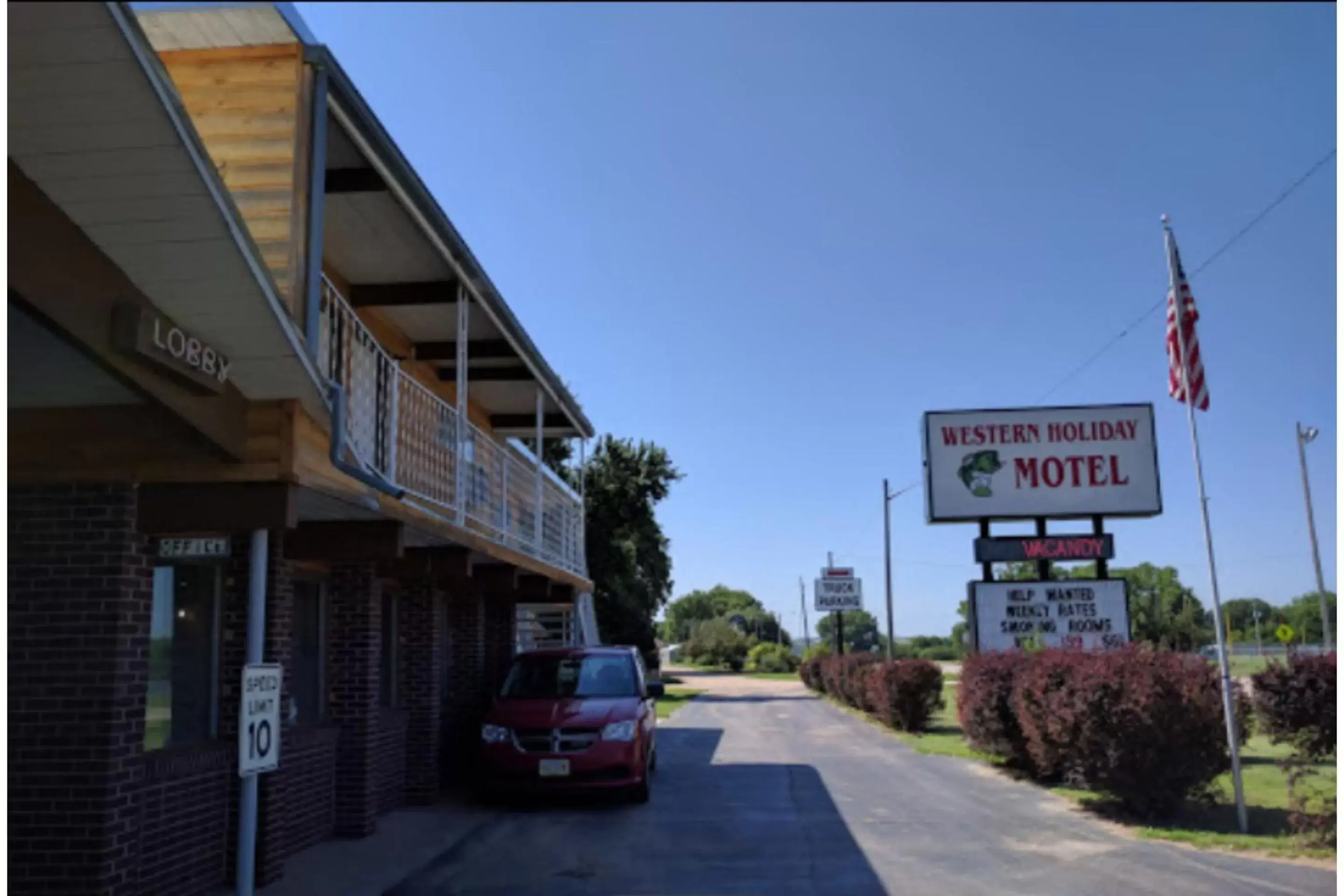 Facade/entrance, Property Building in Love Hotels Western Holiday by OYO at Harlan Lake NE