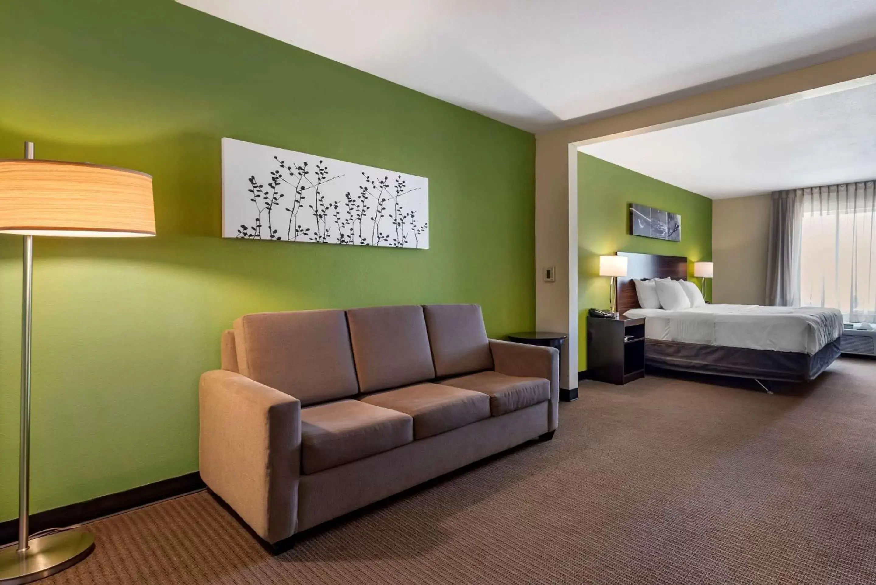 Bedroom in Sleep Inn & Suites Oakley I-70