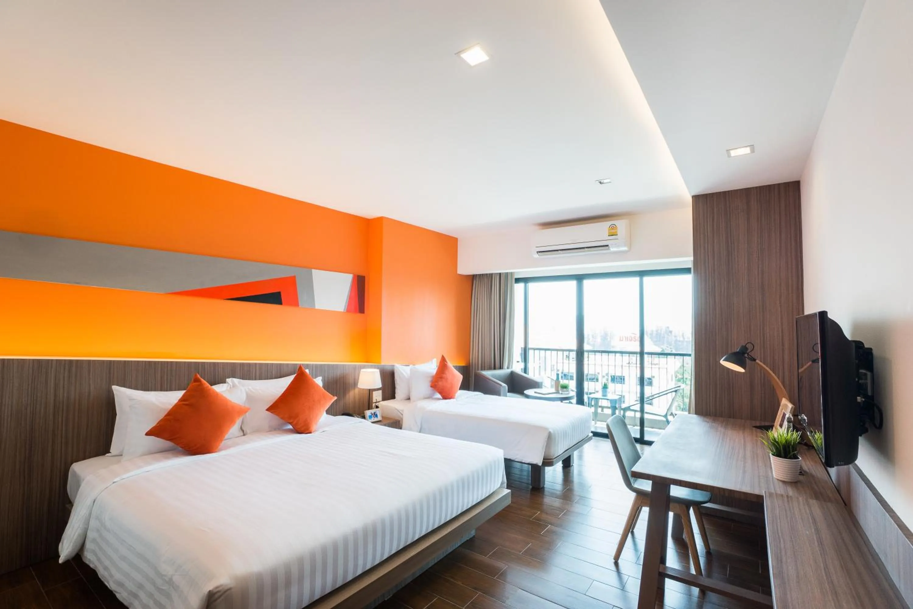 Bed in J Inspired Hotel Pattaya