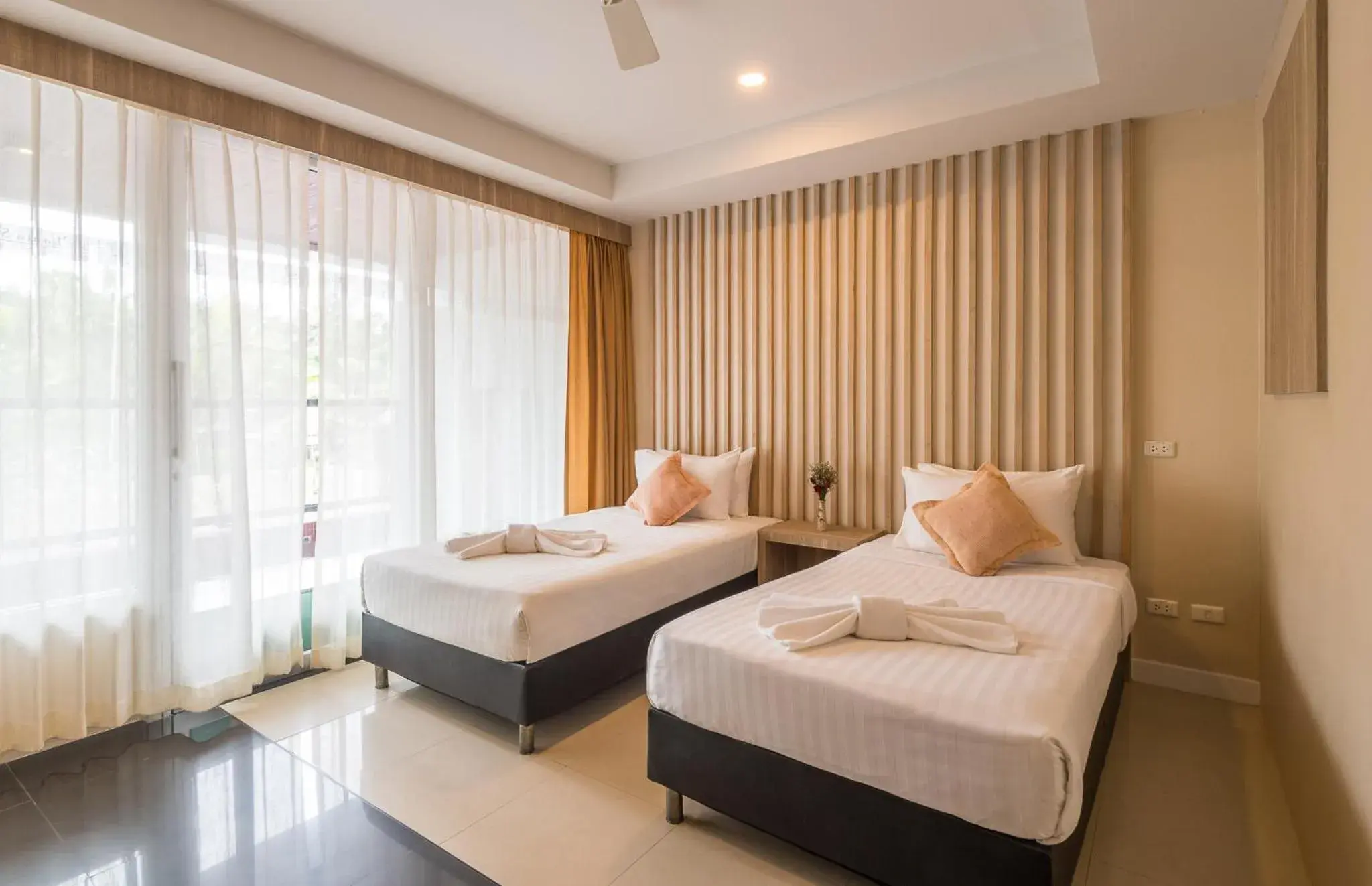 Bed in Lanta Sand Resort & Spa