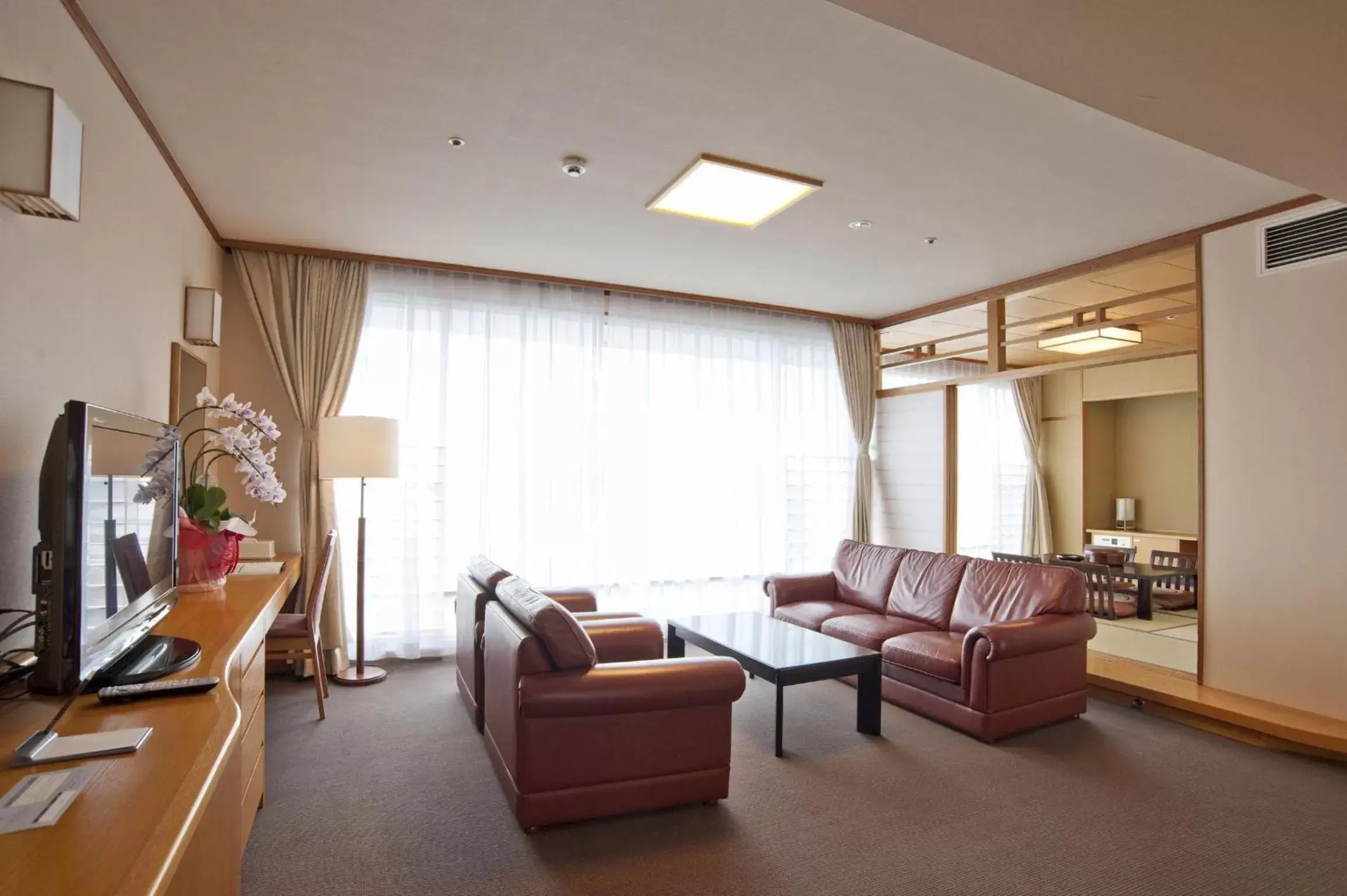 TV and multimedia, Seating Area in Spa and Resort Hotel Solage Oita Hiji Beppuwan