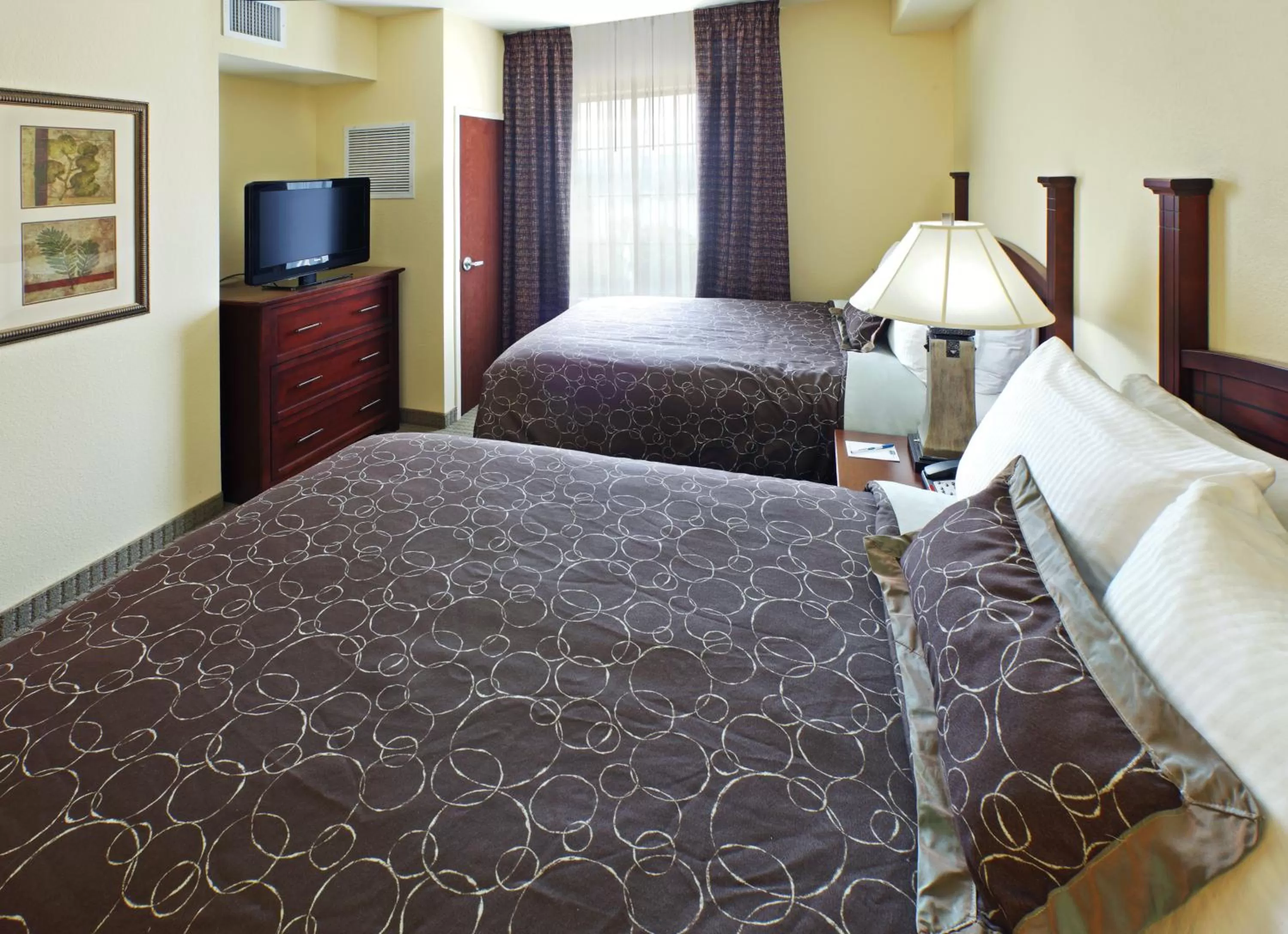 Bed in Staybridge Suites Hot Springs by IHG