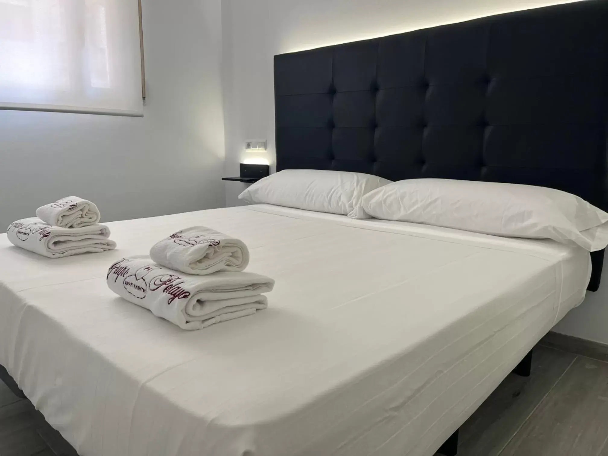 Bed in H Pelayo Auto Check-In Rooms