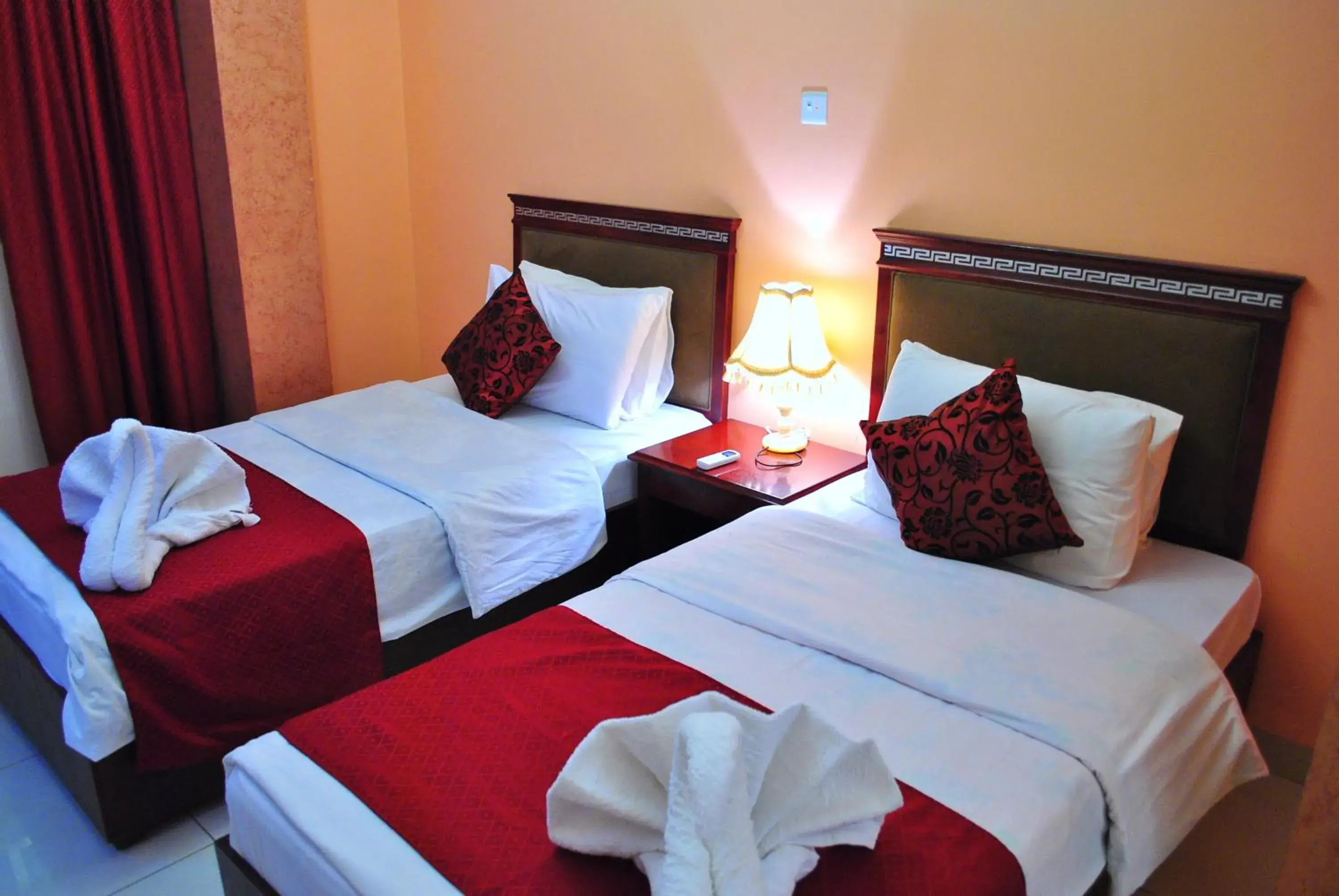 Bed in Al Qidra Hotel & Suites Aqaba