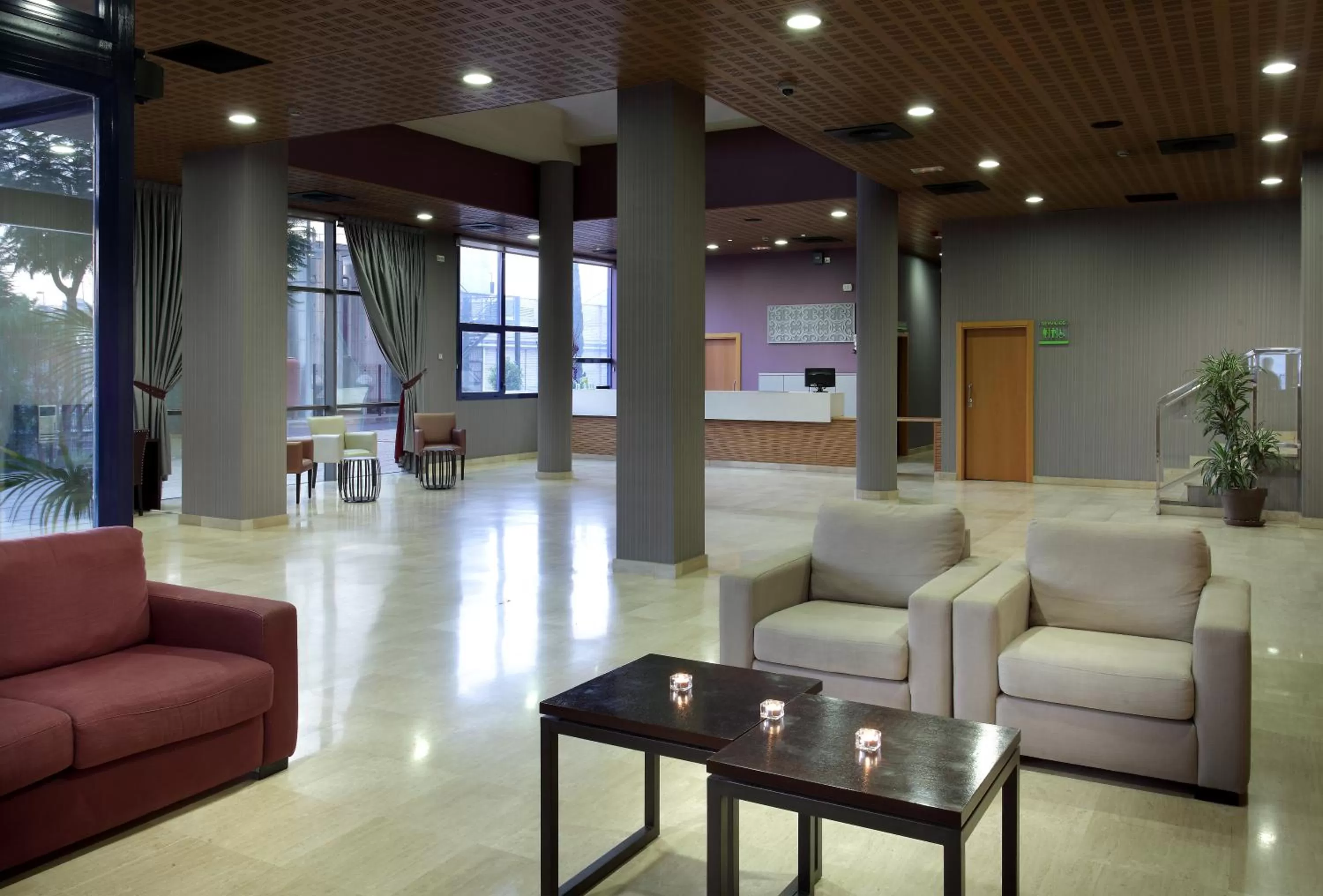 Lobby or reception in Exe Sevilla Palmera