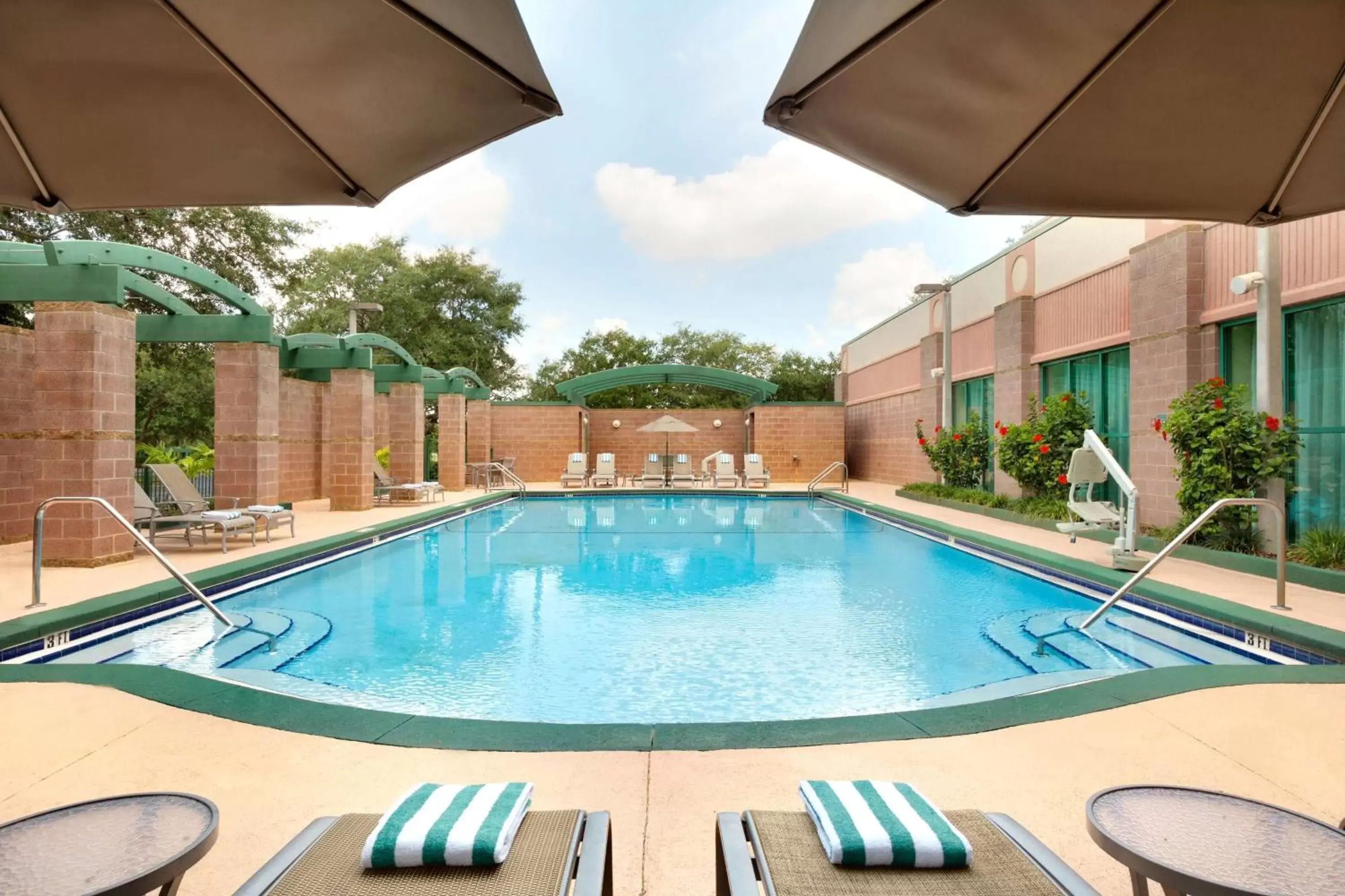 Pool view, Swimming Pool in Embassy Suites by Hilton Tampa USF Near Busch Gardens