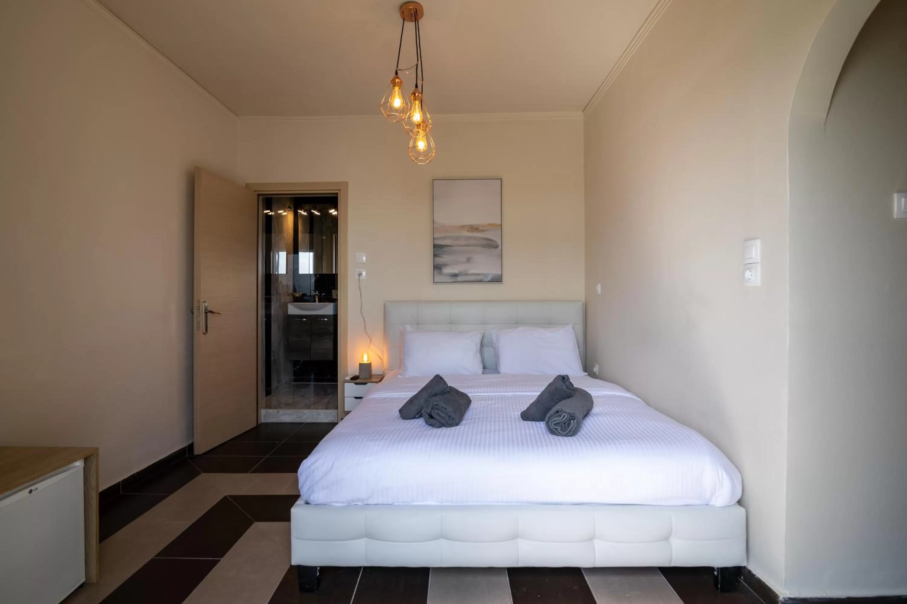 Bed in Votsalakia Hotel & Luxury Apartments