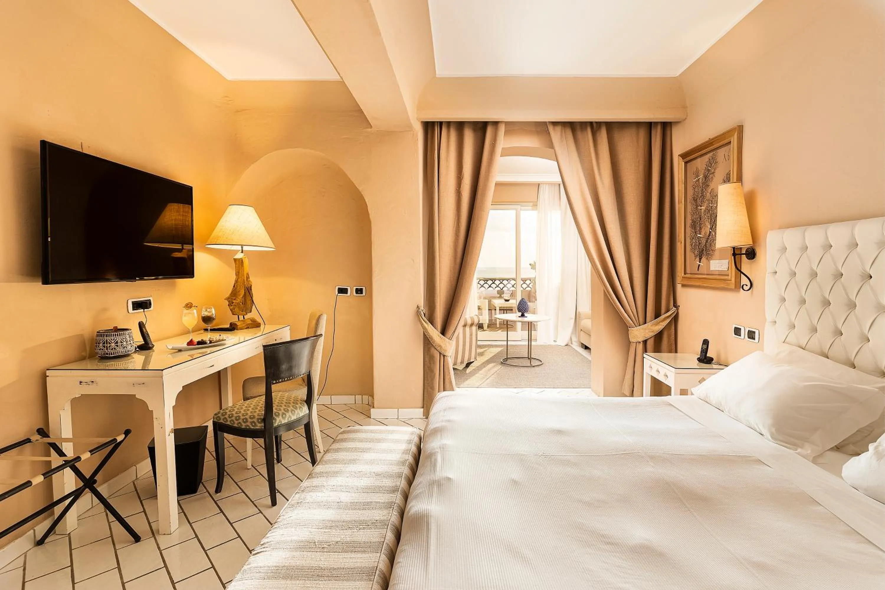 Bed in Therasia Resort Sea and SPA - The Leading Hotels of the World