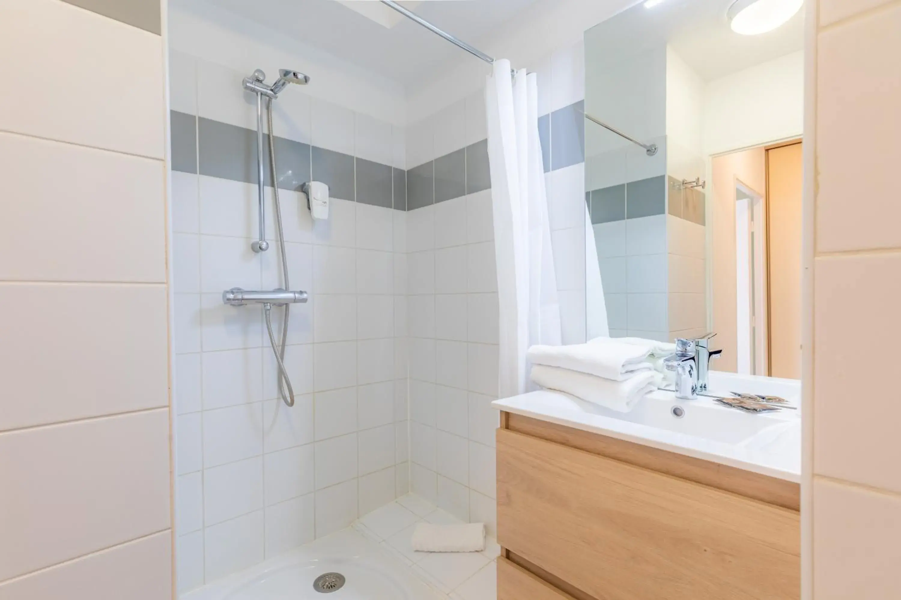 Shower, Bathroom in Appart'City Bourg en Bresse (Ex Park&Suites)