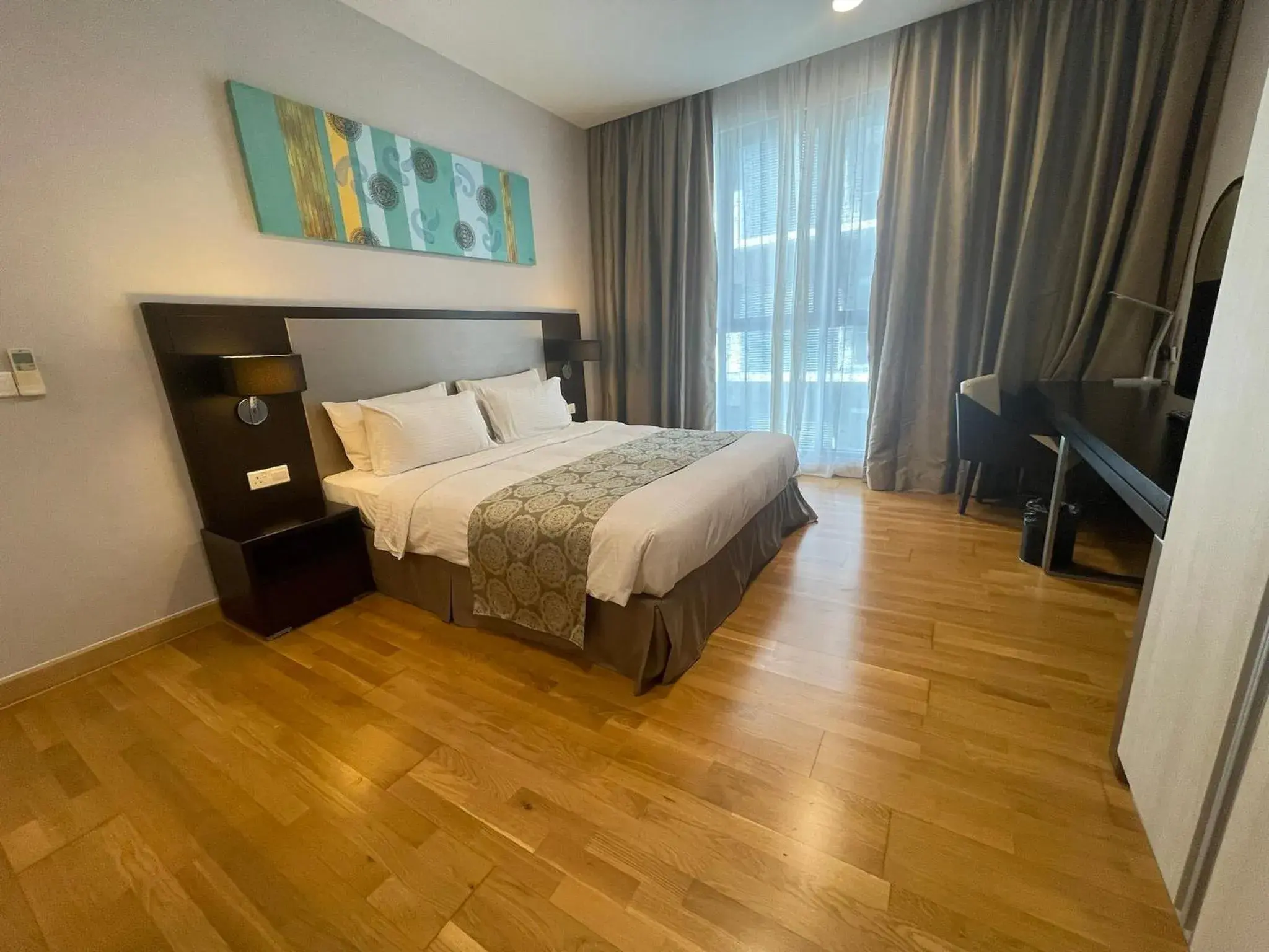 Bed in Trinidad Suites Johor, Trademark Collection by Wyndham