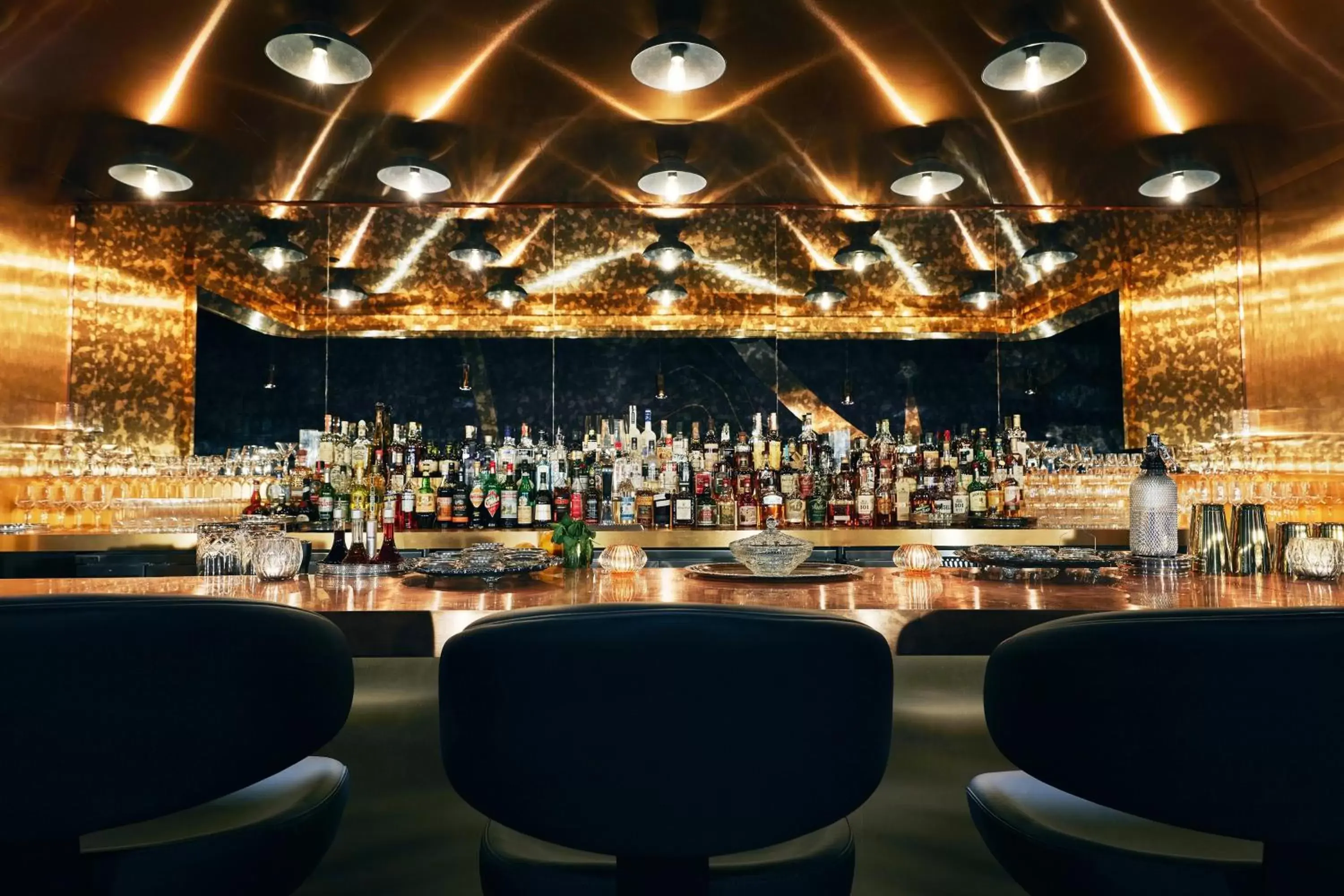 Lounge or bar in Kinley Chattanooga Southside, a Tribute Portfolio Hotel Lounge or bar in Kinley Chattanooga Southside, a Tribute Portfolio Hotel