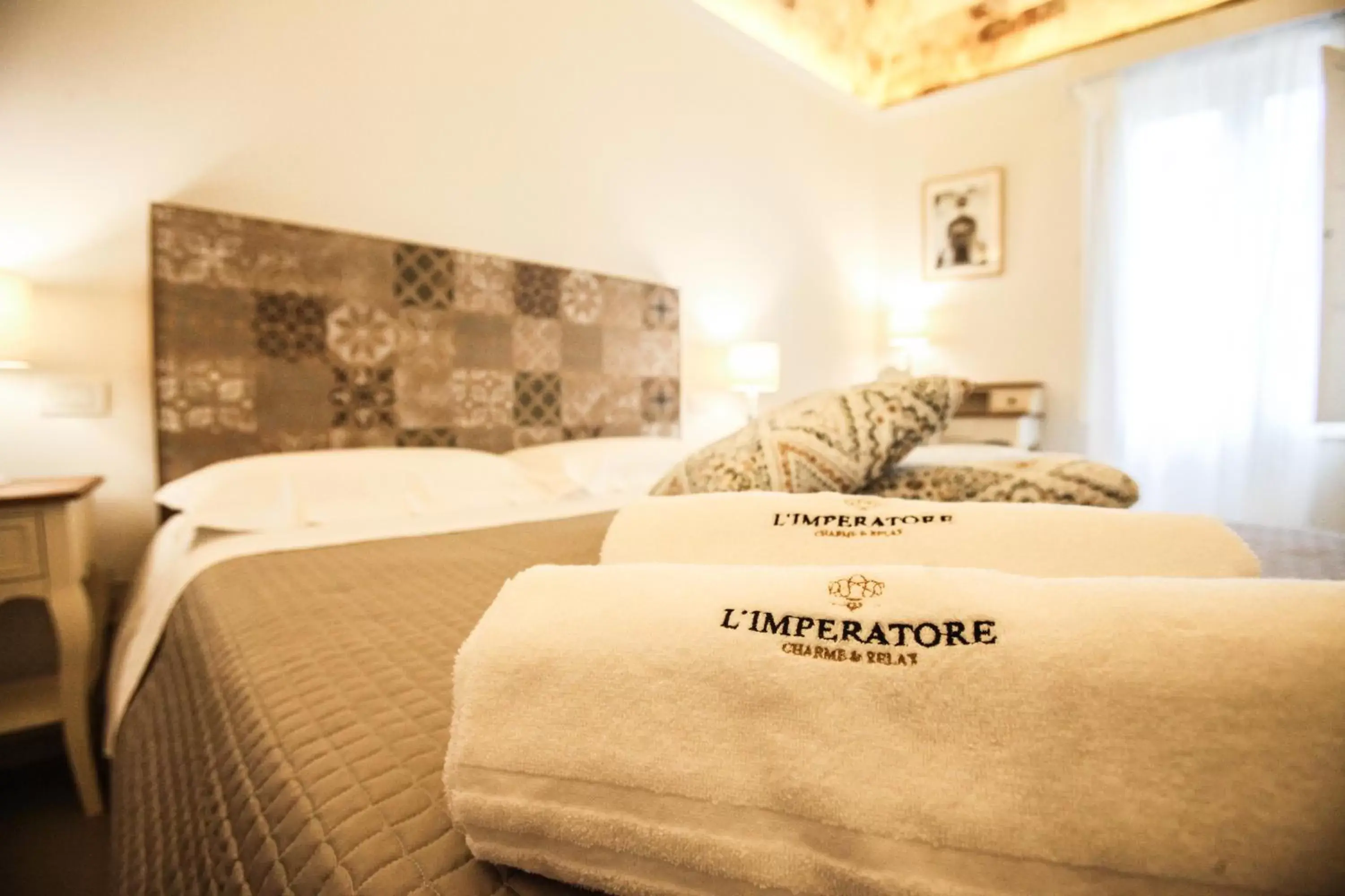 Bed in L'IMPERATORE Relax & Charme