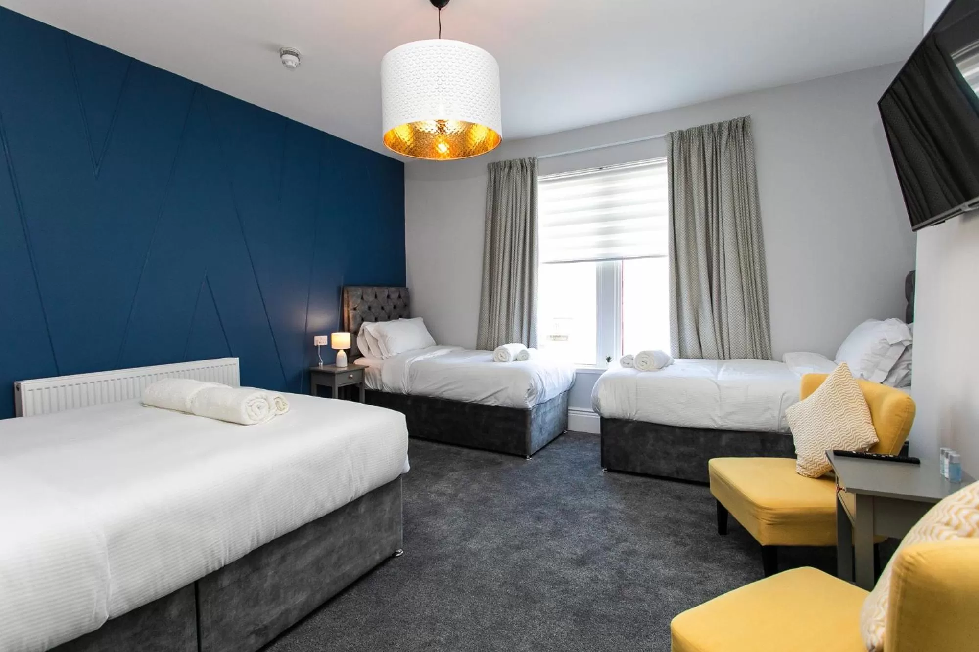 Photo of the whole room, Bed in Stay Coastal