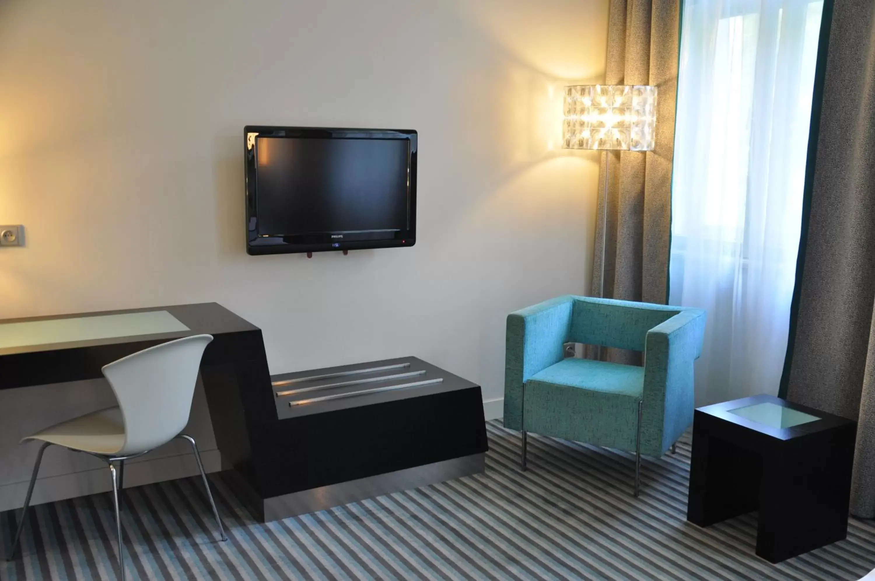 TV and multimedia, TV/Entertainment Center in Red & Blue Design Hotel Prague