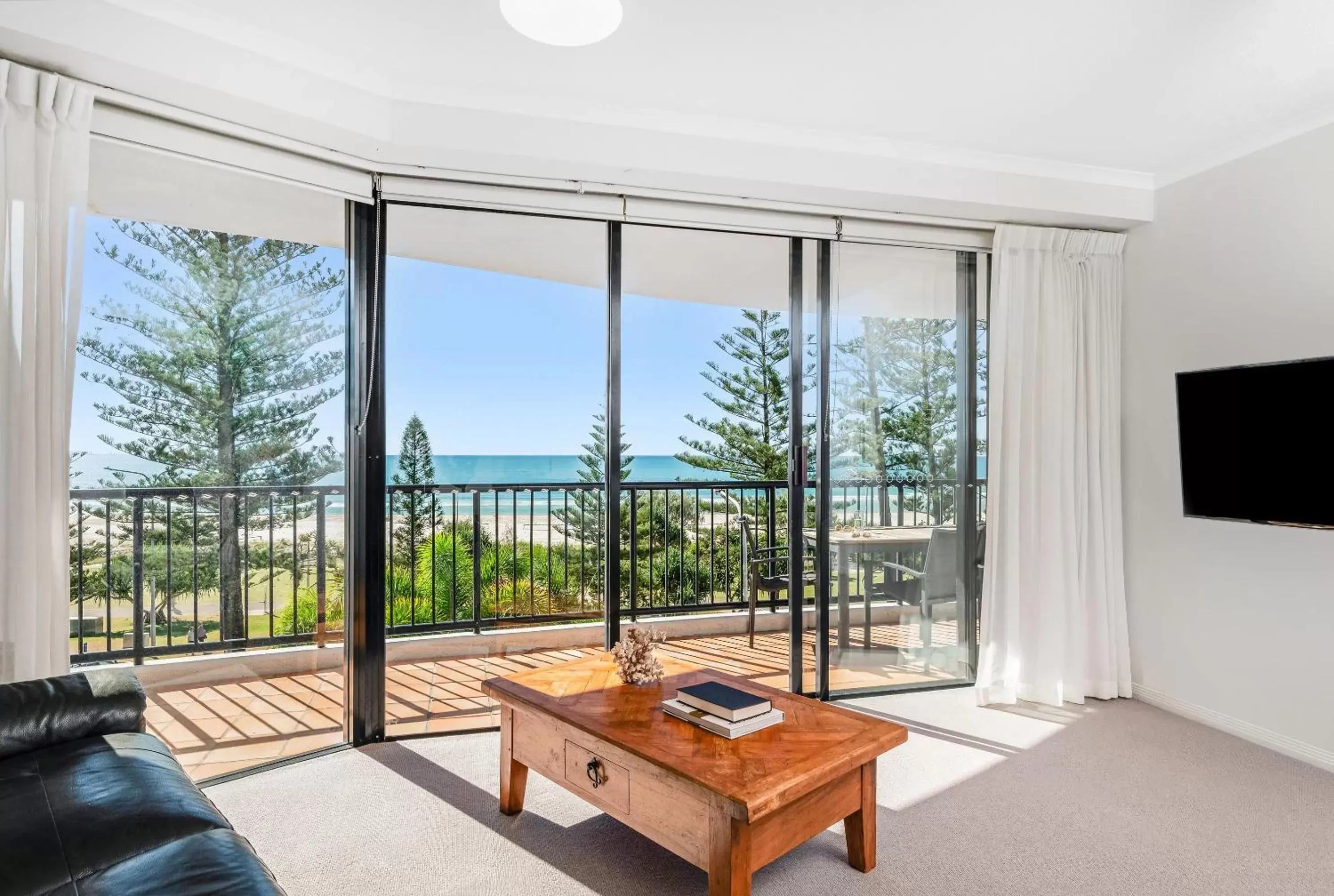 Living room in Mantra Coolangatta Beach Living room in Mantra Coolangatta Beach