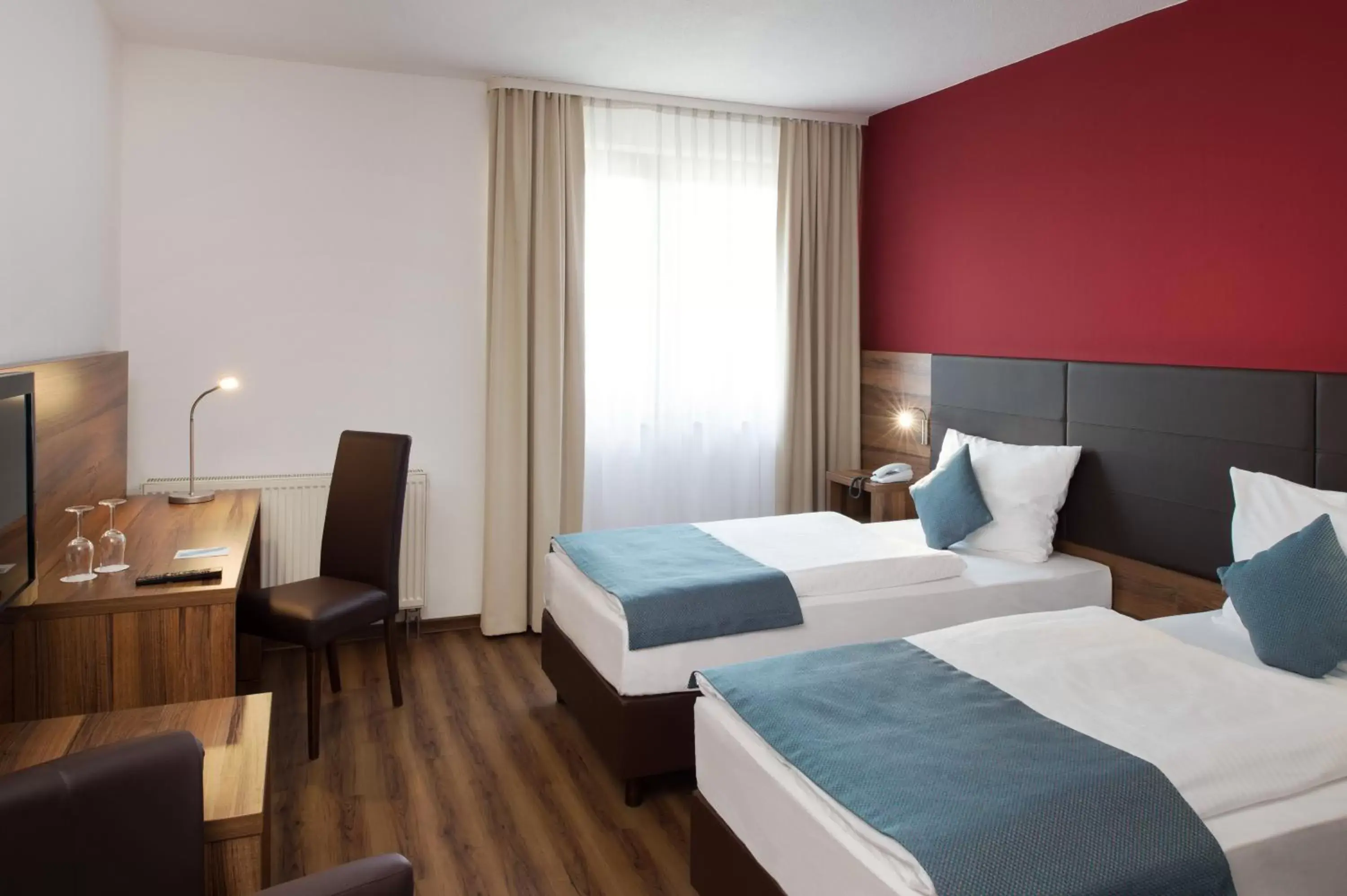 Bed in ACHAT Hotel Wetzlar