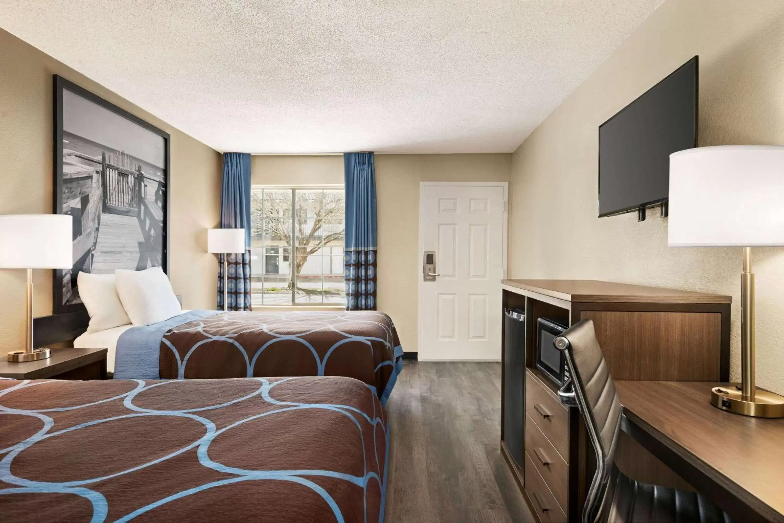 Bedroom in Super 8 by Wyndham Gulfport Near Biloxi