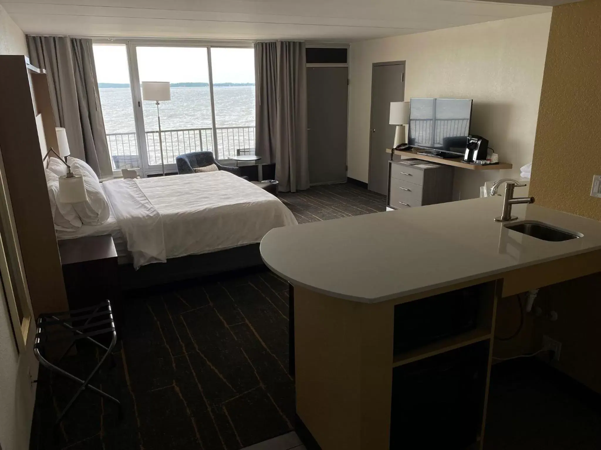 Bedroom in Holiday Inn Detroit Lakes, an IHG Hotel