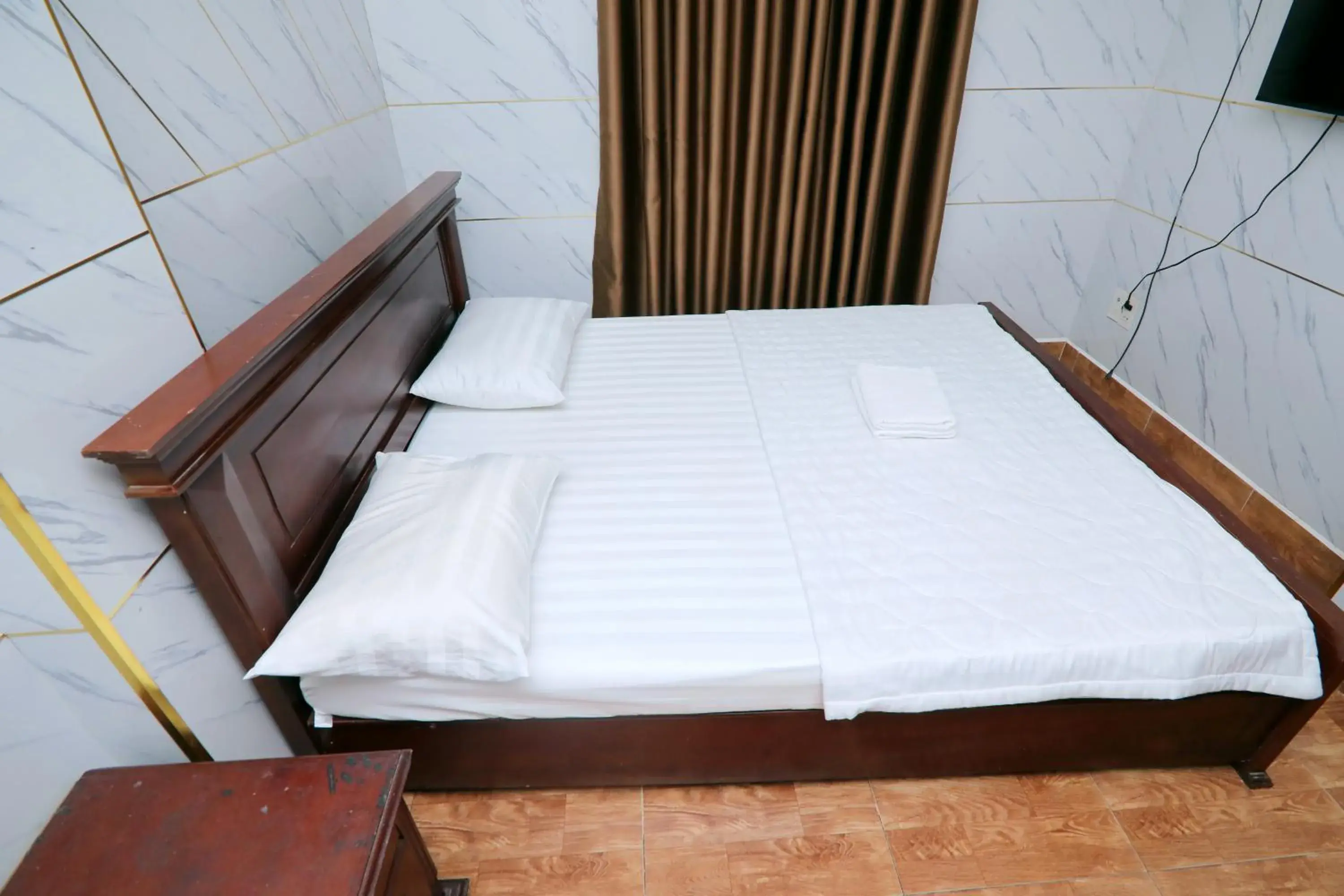 Bed in Khach San Sao Mai Xanh