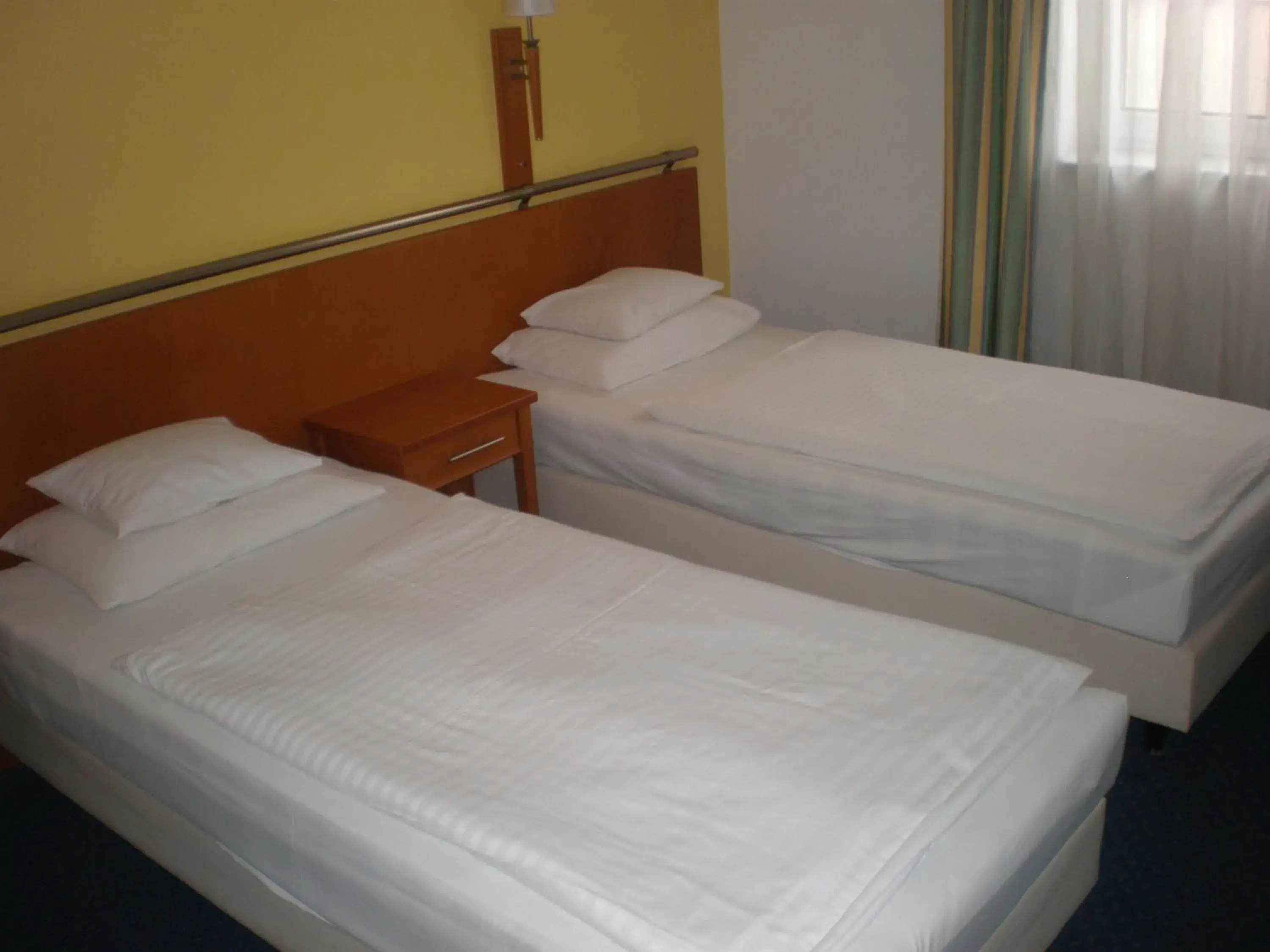 Bed in Hotel Veritas