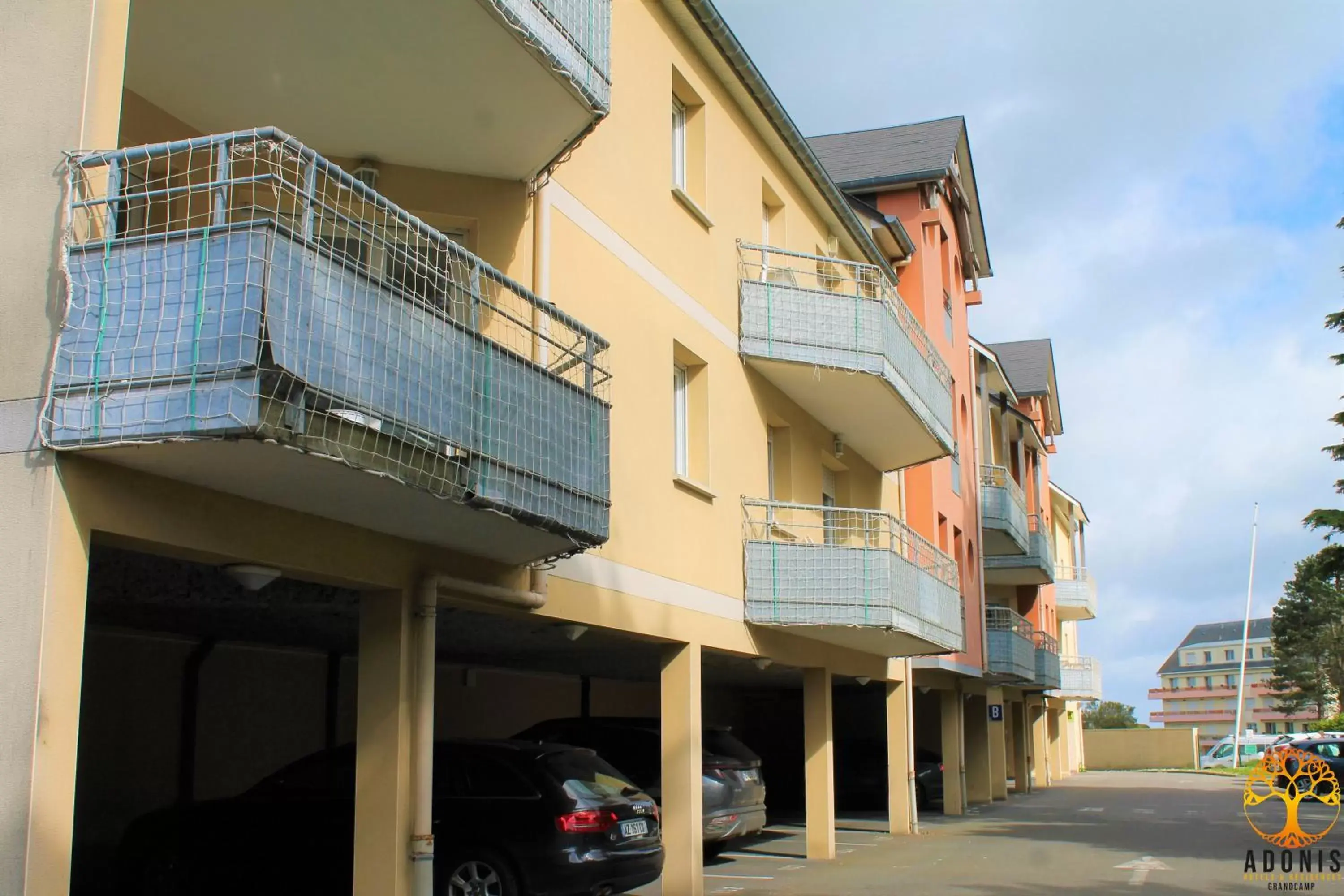 Parking, Property Building in Adonis Grandcamp - Résidence Les Isles De Sola