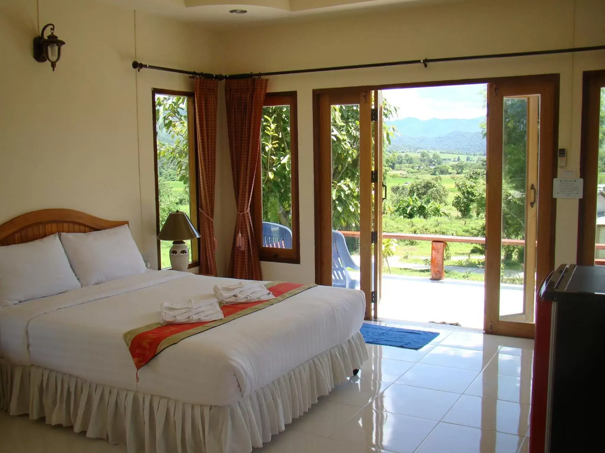 Photo of the whole room, Bed in Pai Iyara Resort