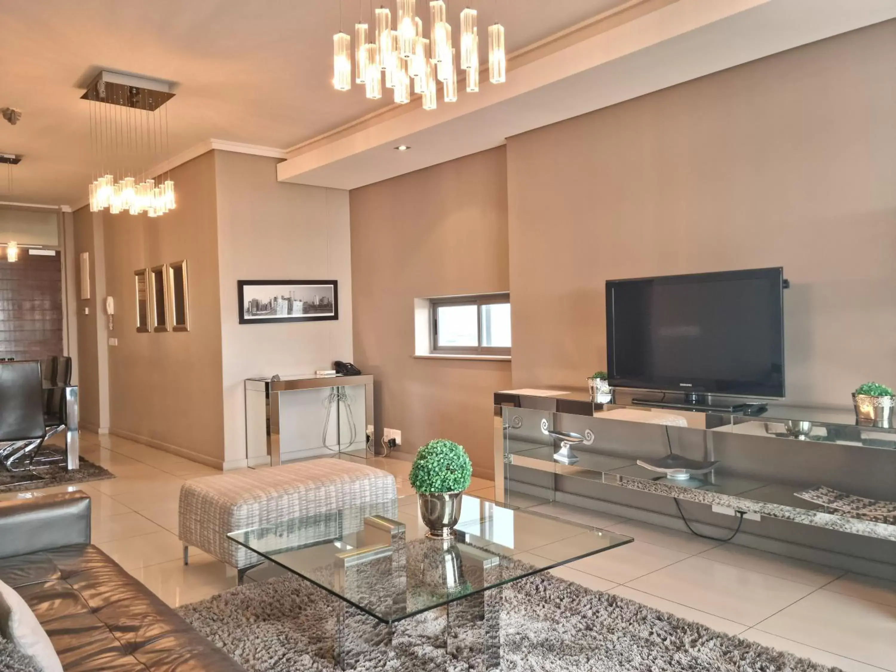 Seating area, TV/Entertainment Center in The Residences at Crystal Towers
