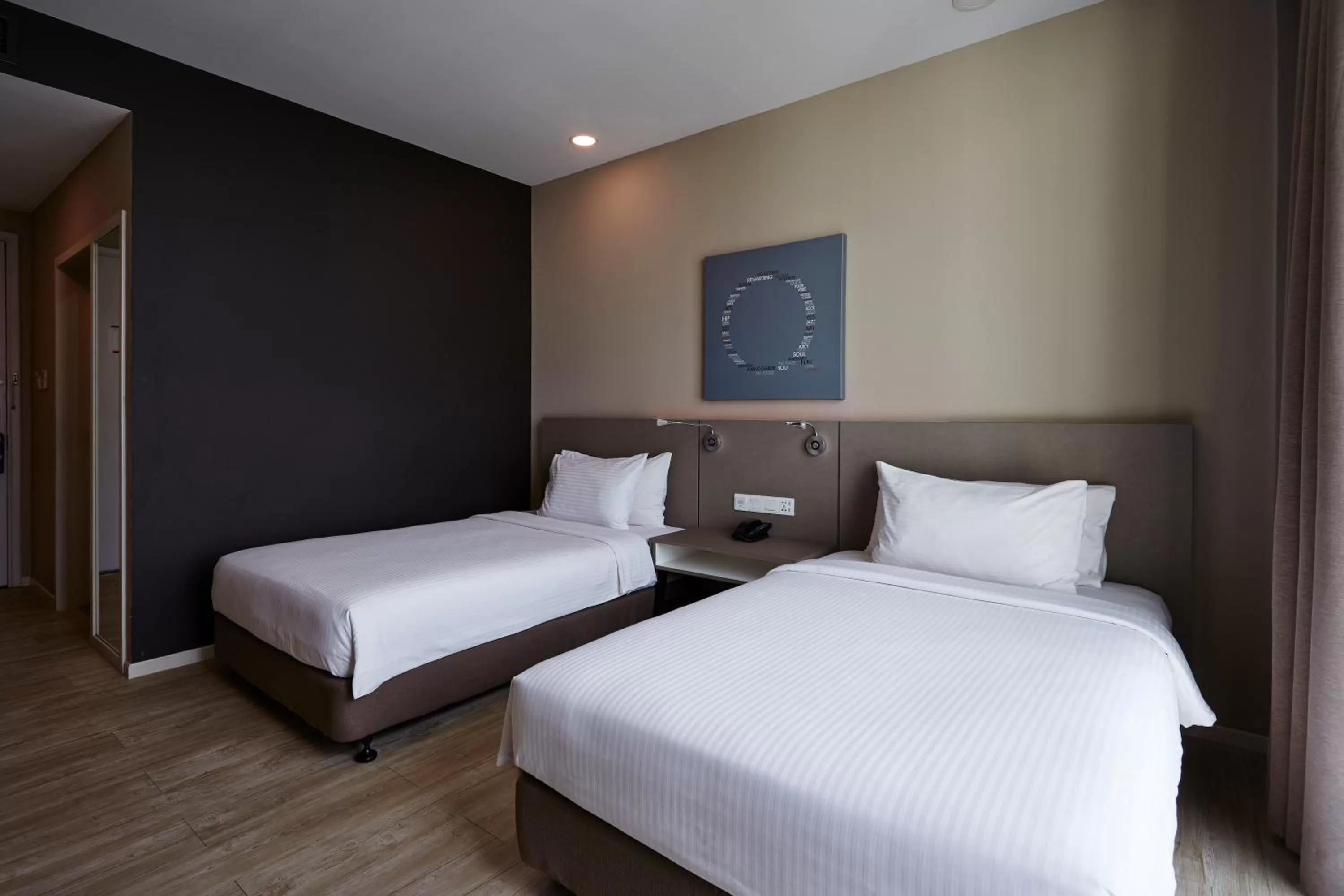 Bed in Qliq Damansara Hotel