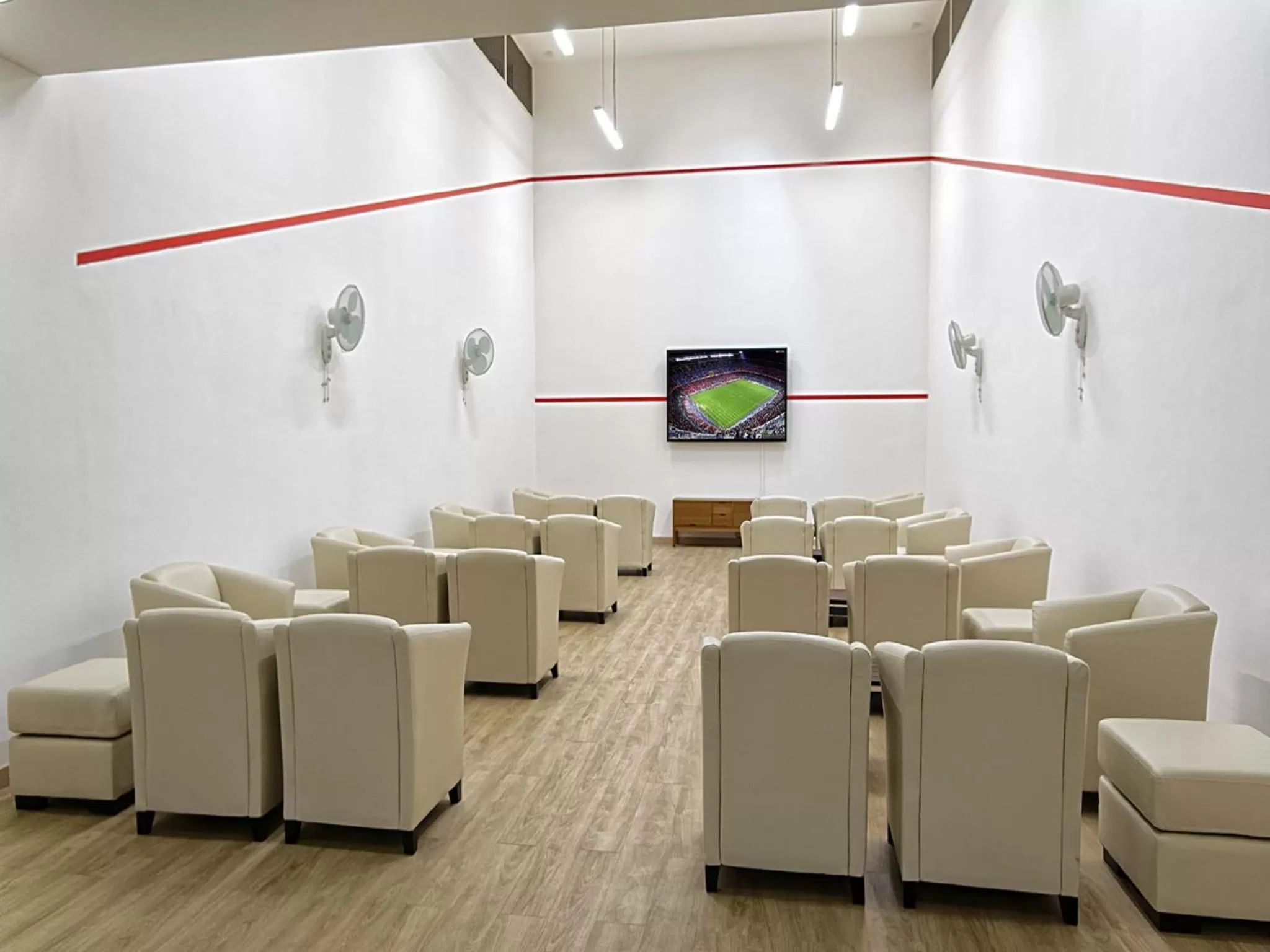 Communal lounge/ TV room in Idyll Suites - Adults Only