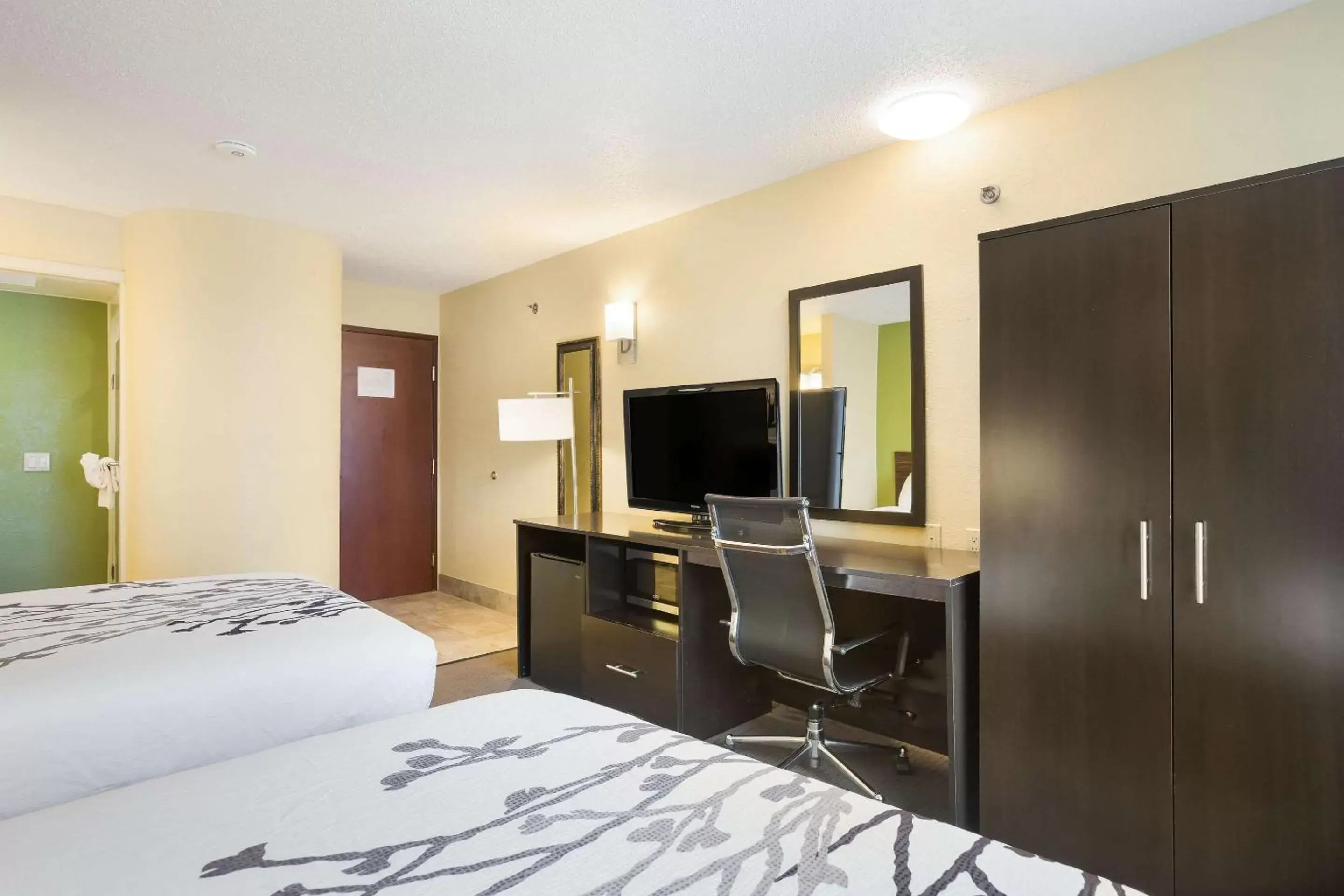 Photo of the whole room, TV/Entertainment Center in Sleep Inn & Suites