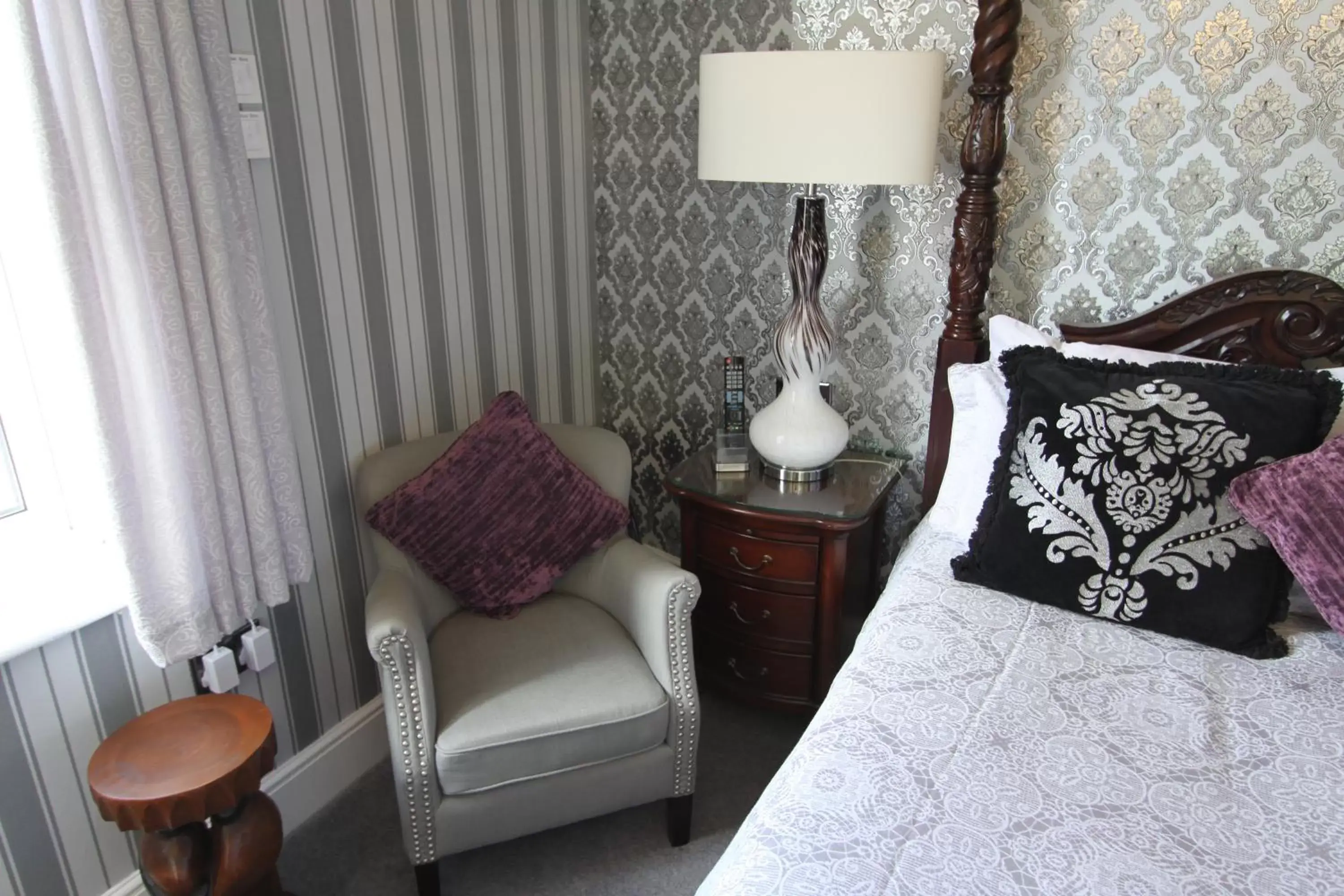 Bedroom, Seating Area in Tower Guest House