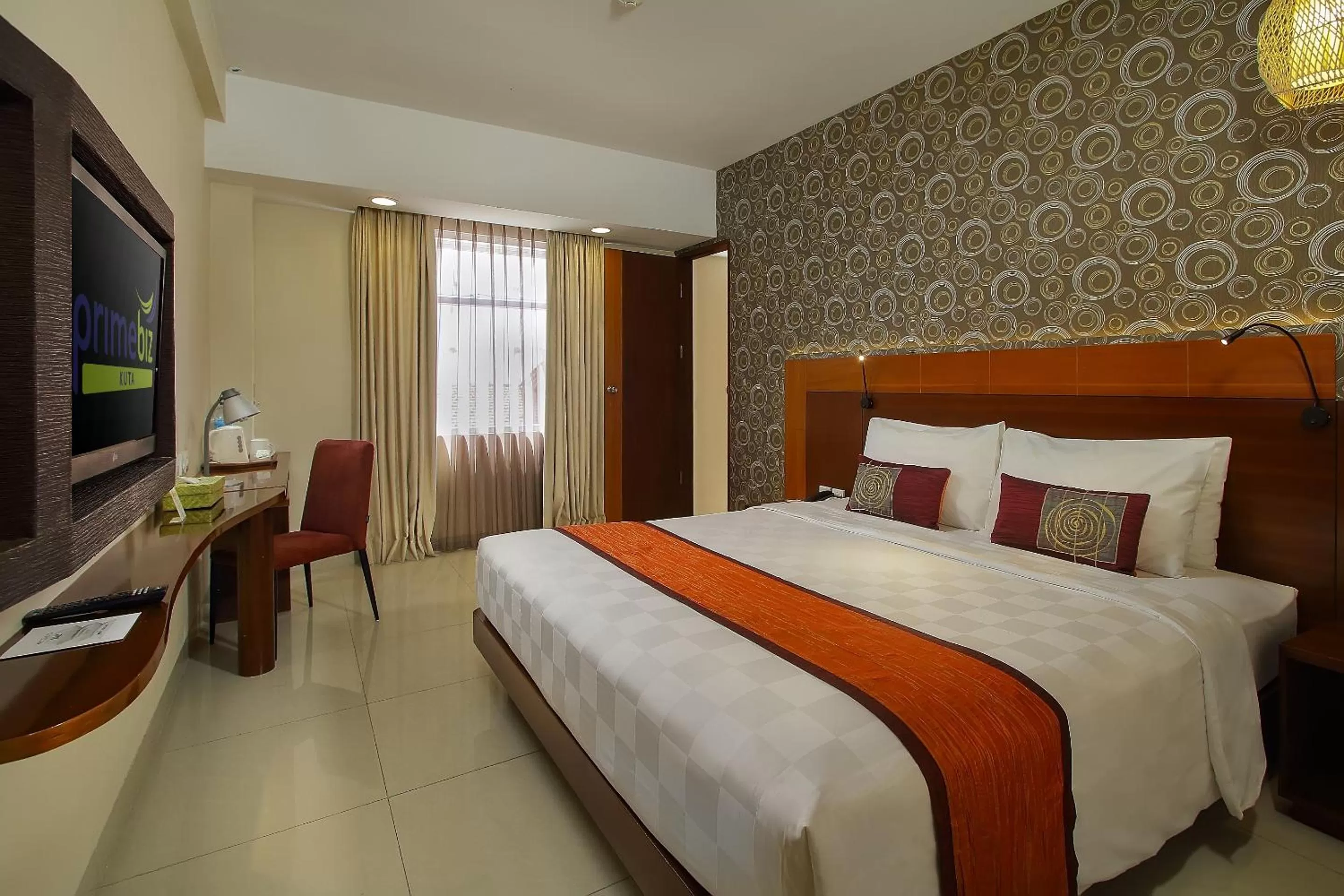 Bedroom, Bed in PrimeBiz Hotel Kuta