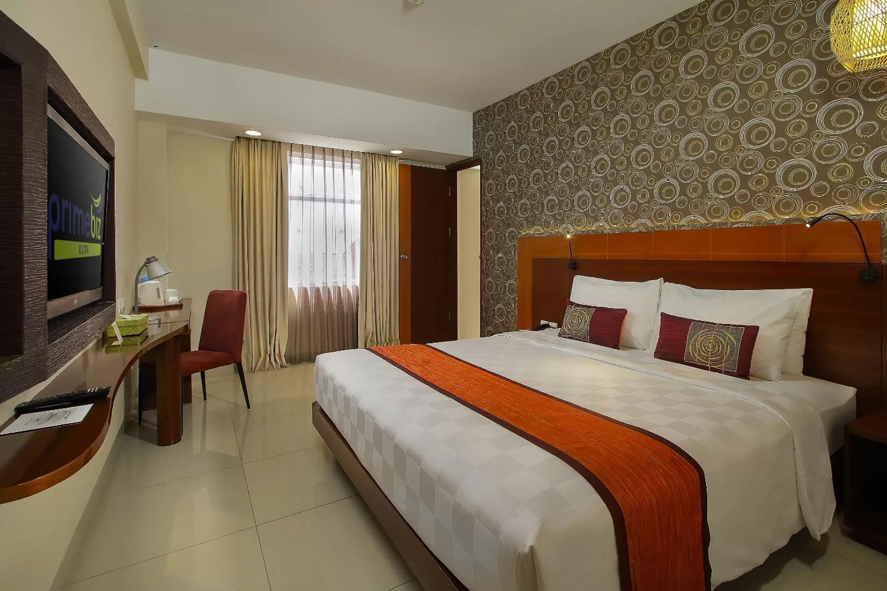 Bedroom, Bed in PrimeBiz Hotel Kuta