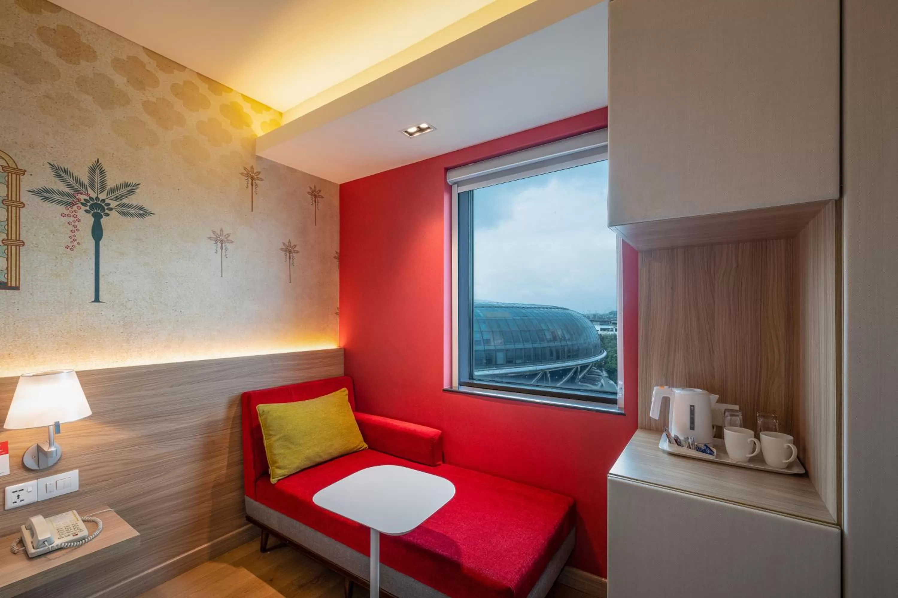 Seating area, Bed in ibis Mumbai Airport - An Accor Brand