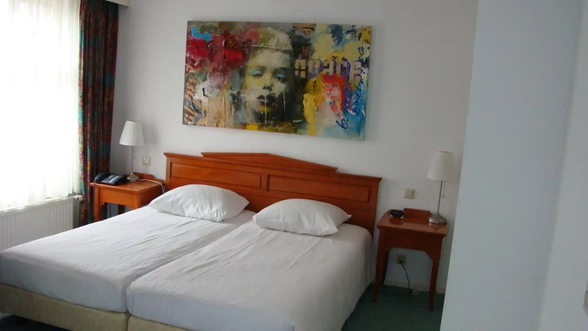Photo of the whole room, Bed in Hotel & Brasserie de Zwaan Venray