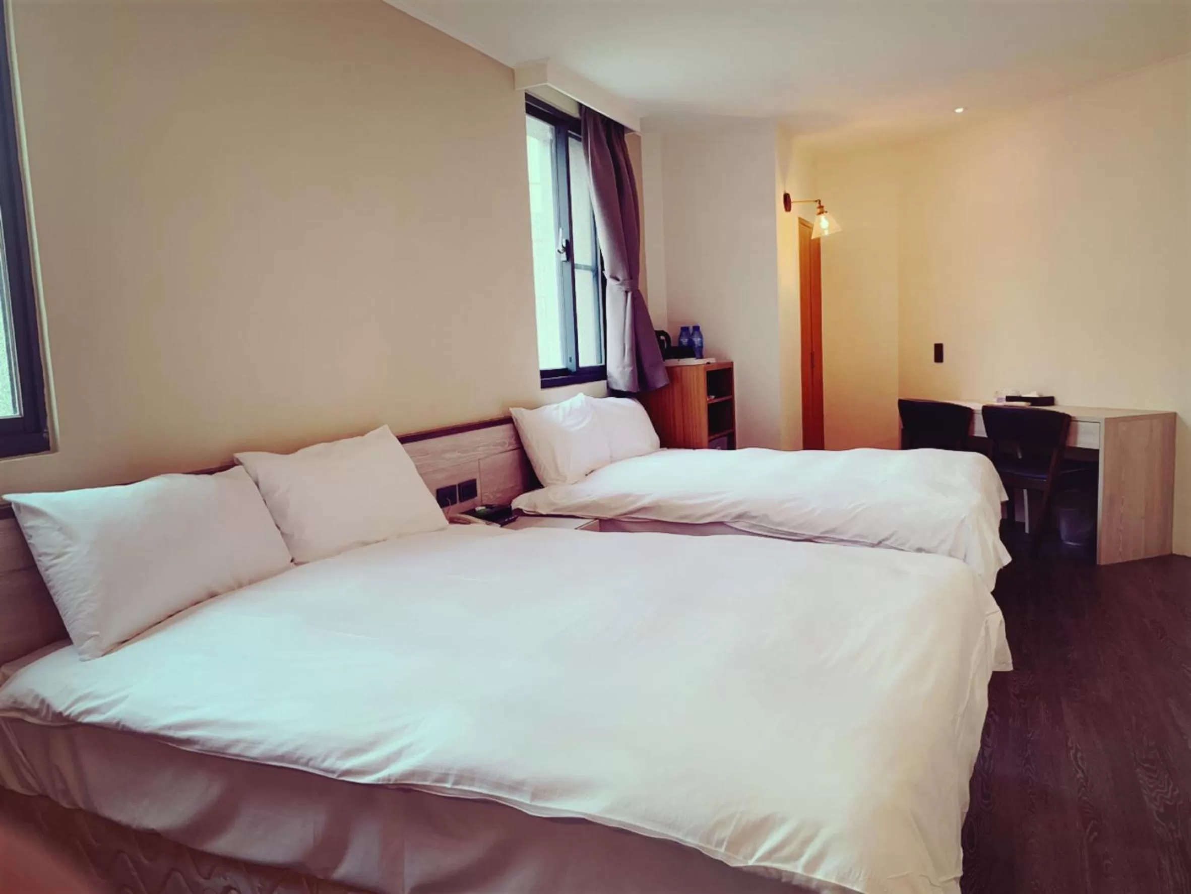 Bed in Raise Hotel Taichung