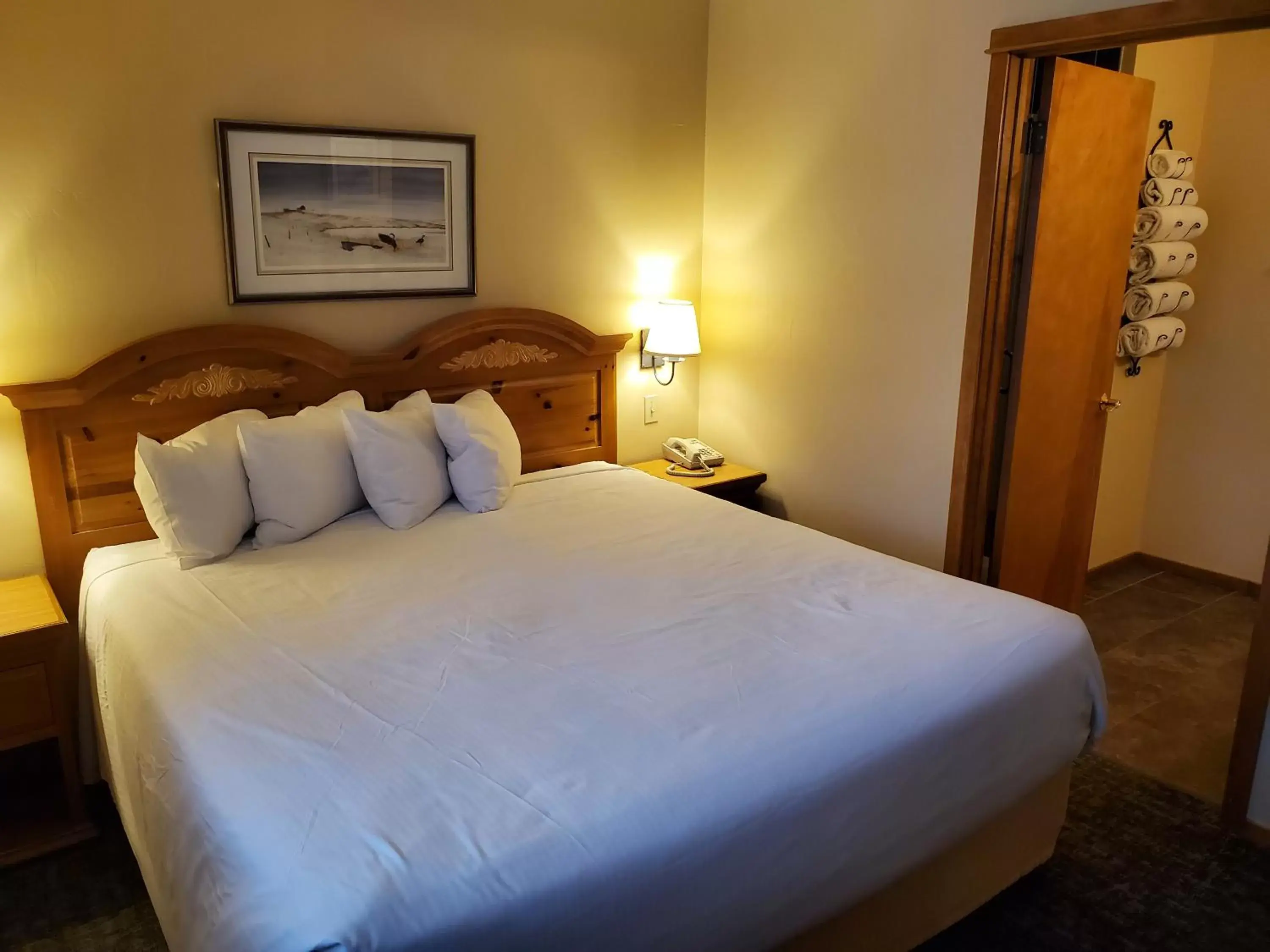 Bedroom, Bed in Homestead Suites - Fish Creek