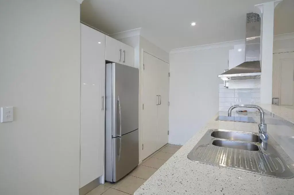 Kitchen/Kitchenette in Macquarie Waters Boutique Apartment Hotel