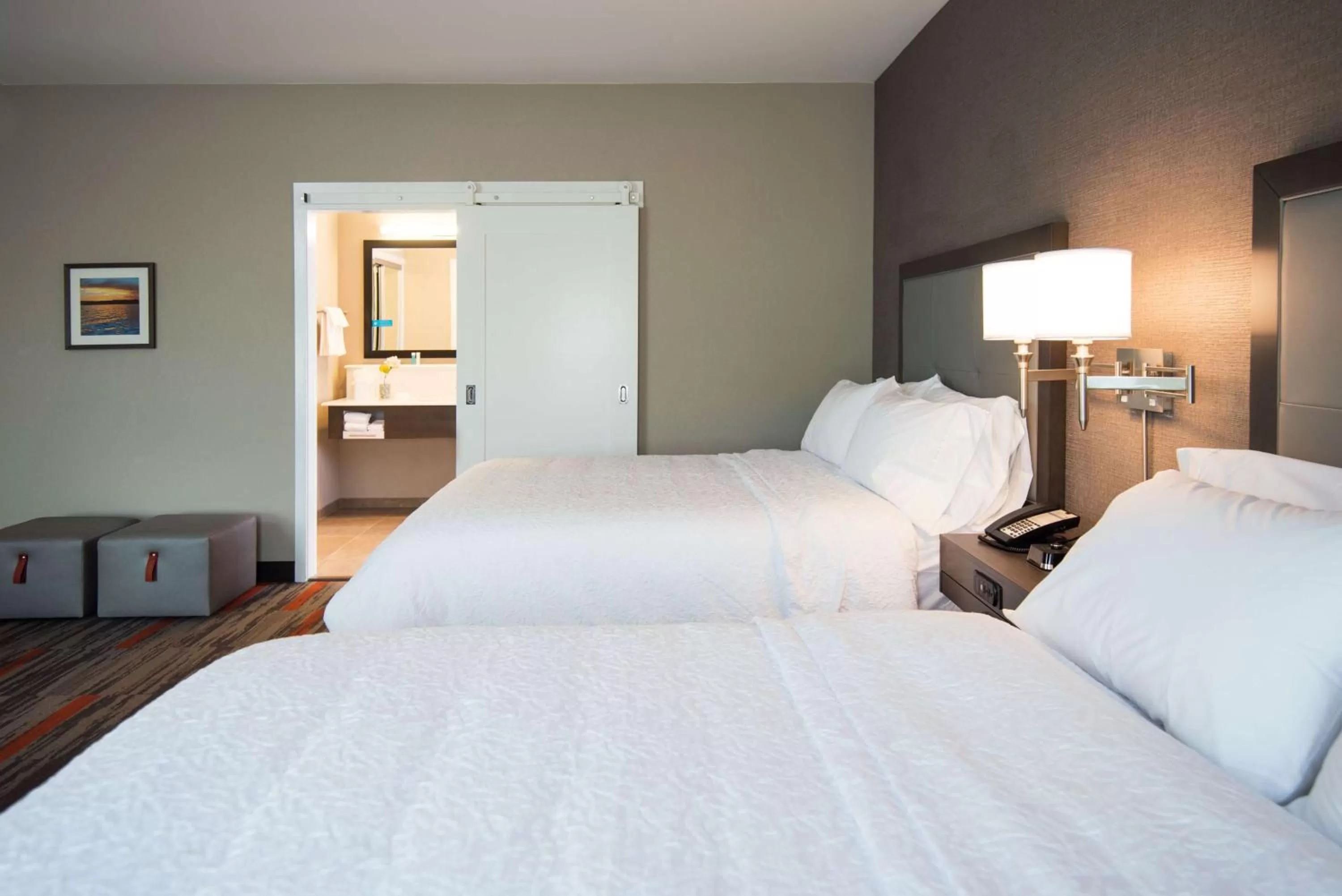 Bed in Hampton Inn and Suites at Wisconsin Dells Lake Delton