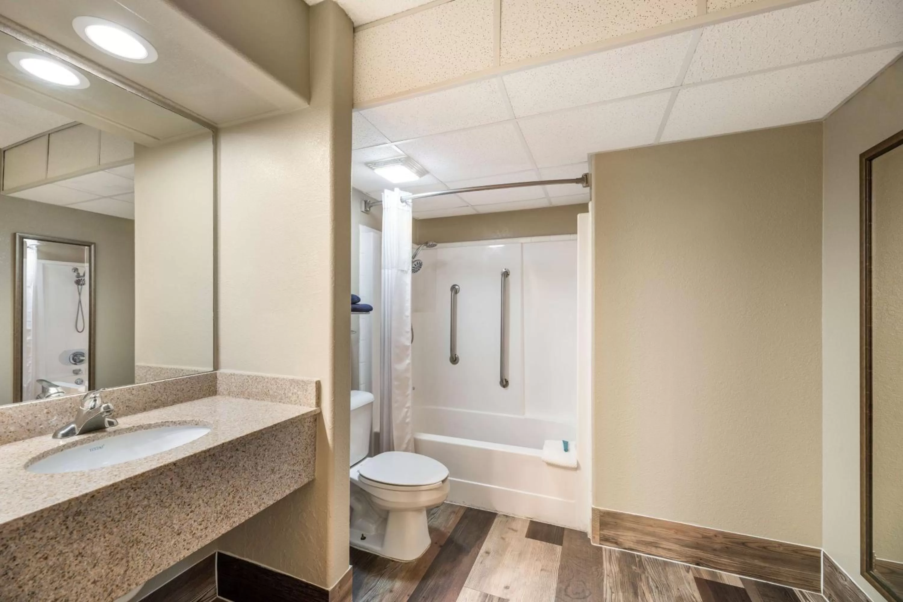 King Room with Roll-In Shower - Disability Access in Pearl on the Concho SureStay Collection by Best Western