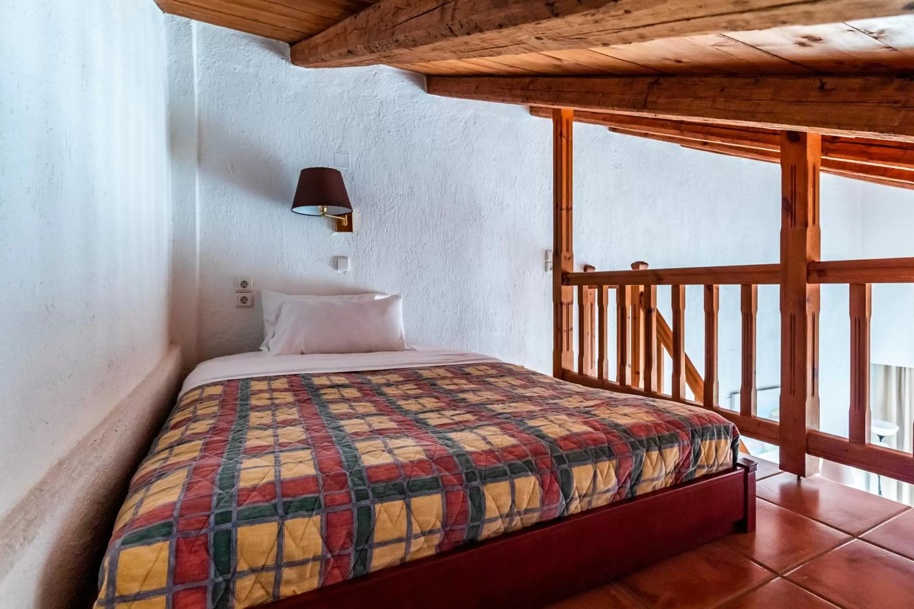 Bed in Rigas Hotel Skopelos