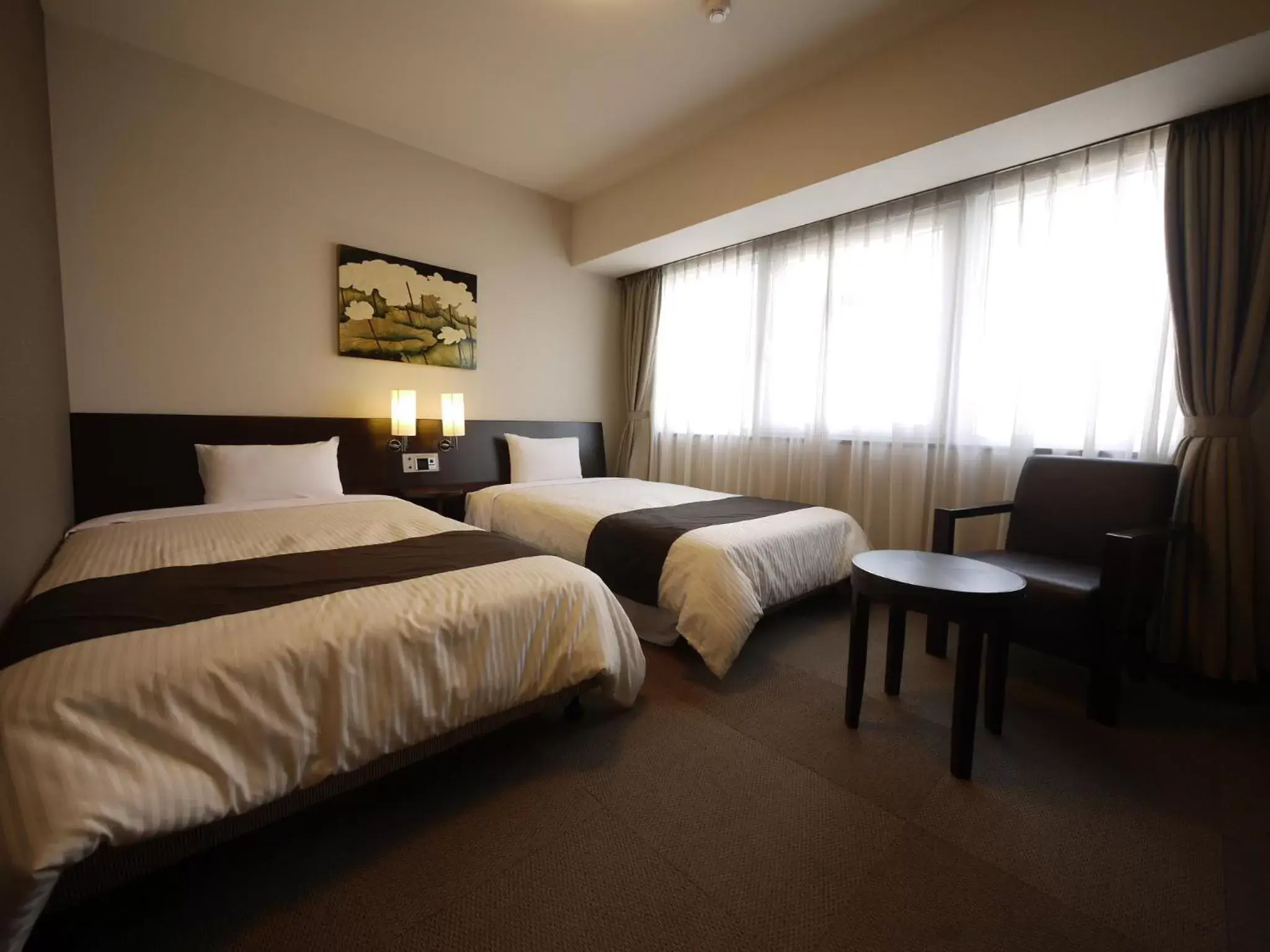 Photo of the whole room, Bed in Hotel Route-Inn Saga Ekimae