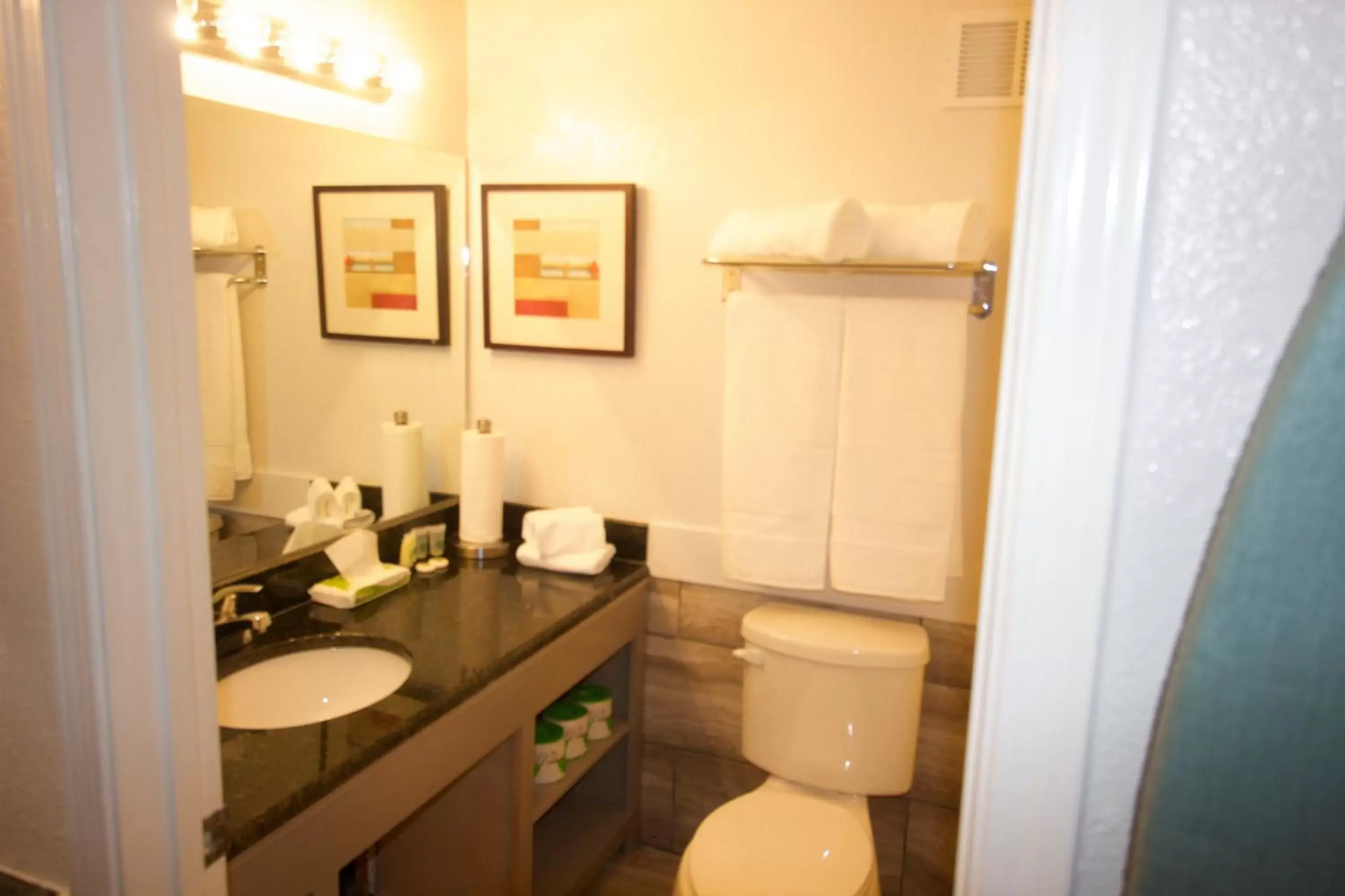 Toilet, Bathroom in At Home Inn & Suites