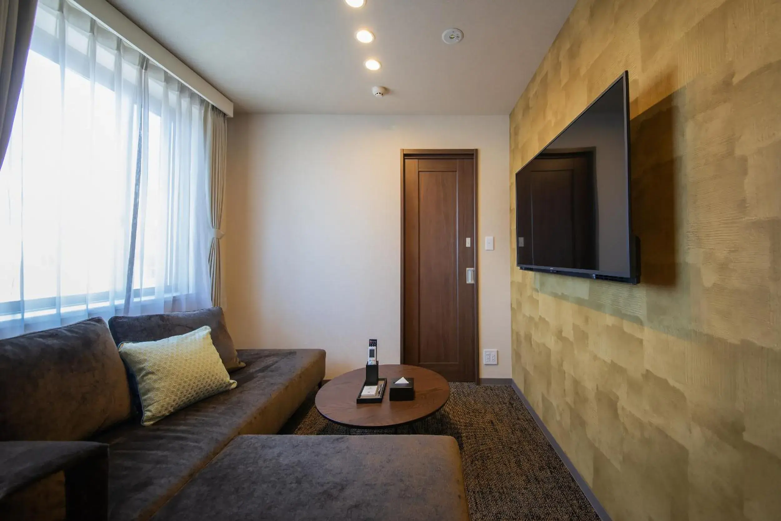Communal lounge/ TV room, Seating Area in Hotel Celeste Shizuoka