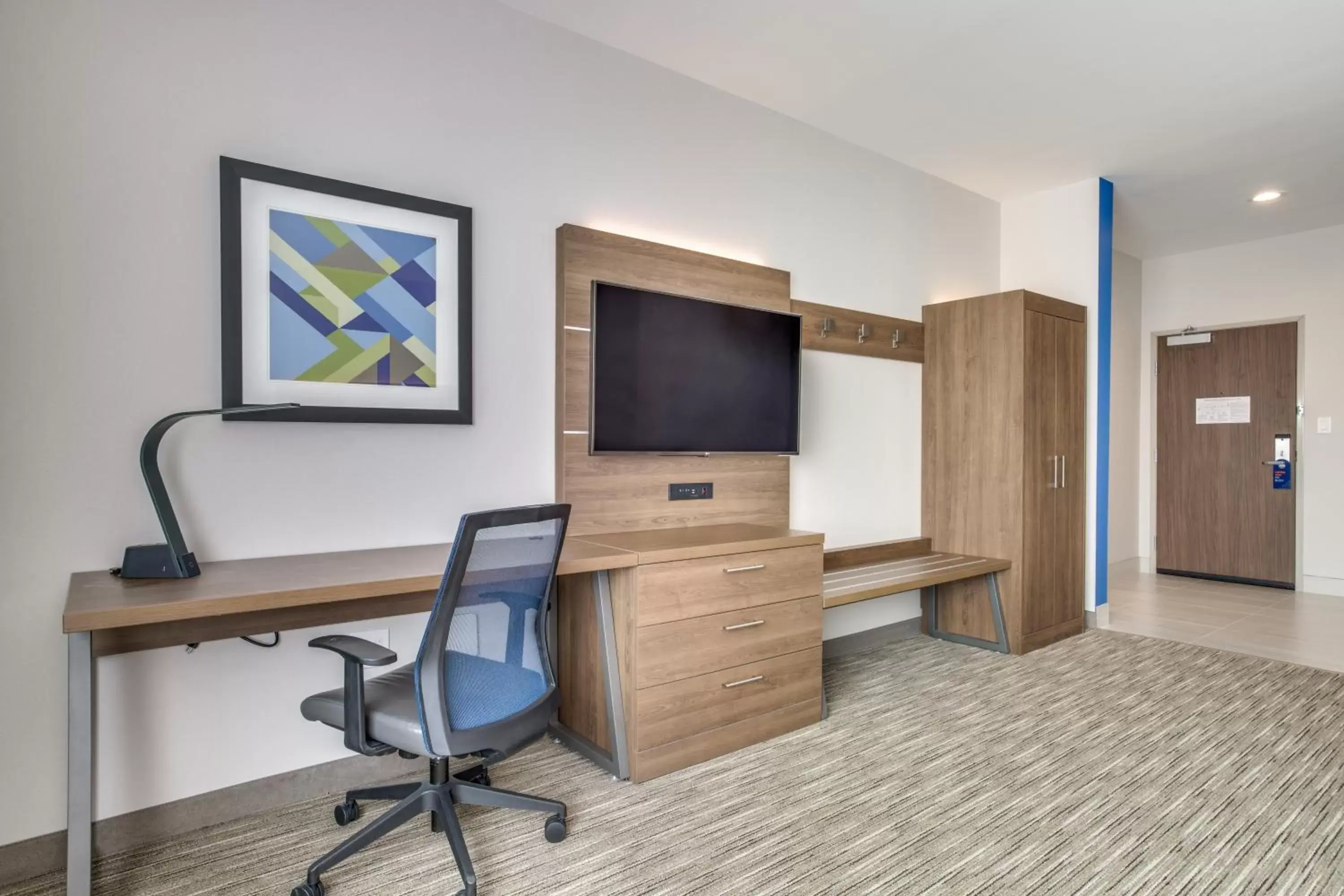 TV/Entertainment Center in Holiday Inn Express & Suites - Denton South, an IHG Hotel