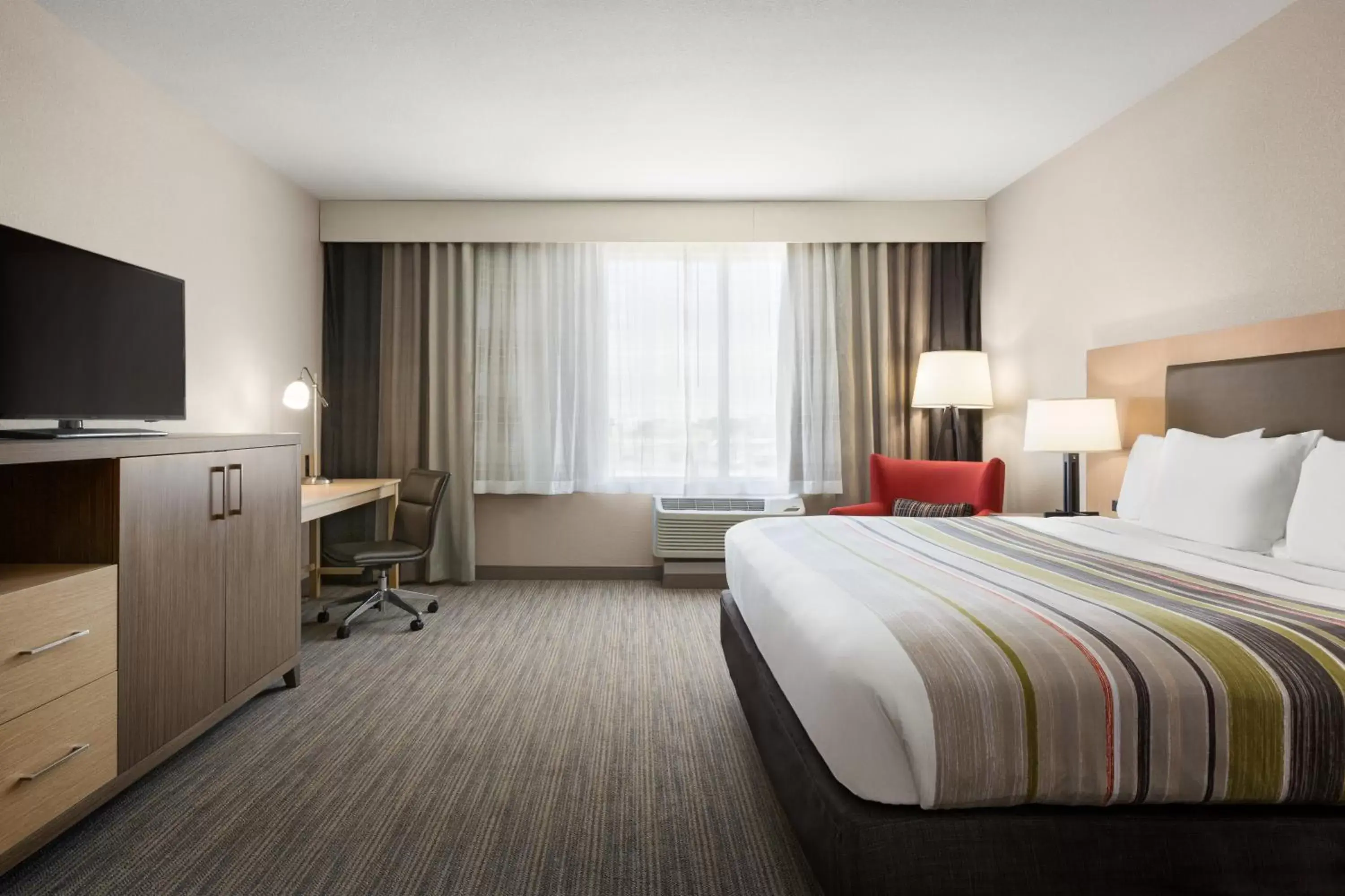 Photo of the whole room, Bed in Country Inn & Suites by Radisson, New Braunfels, TX Photo of the whole room, Bed in Country Inn & Suites by Radisson, New Braunfels, TX