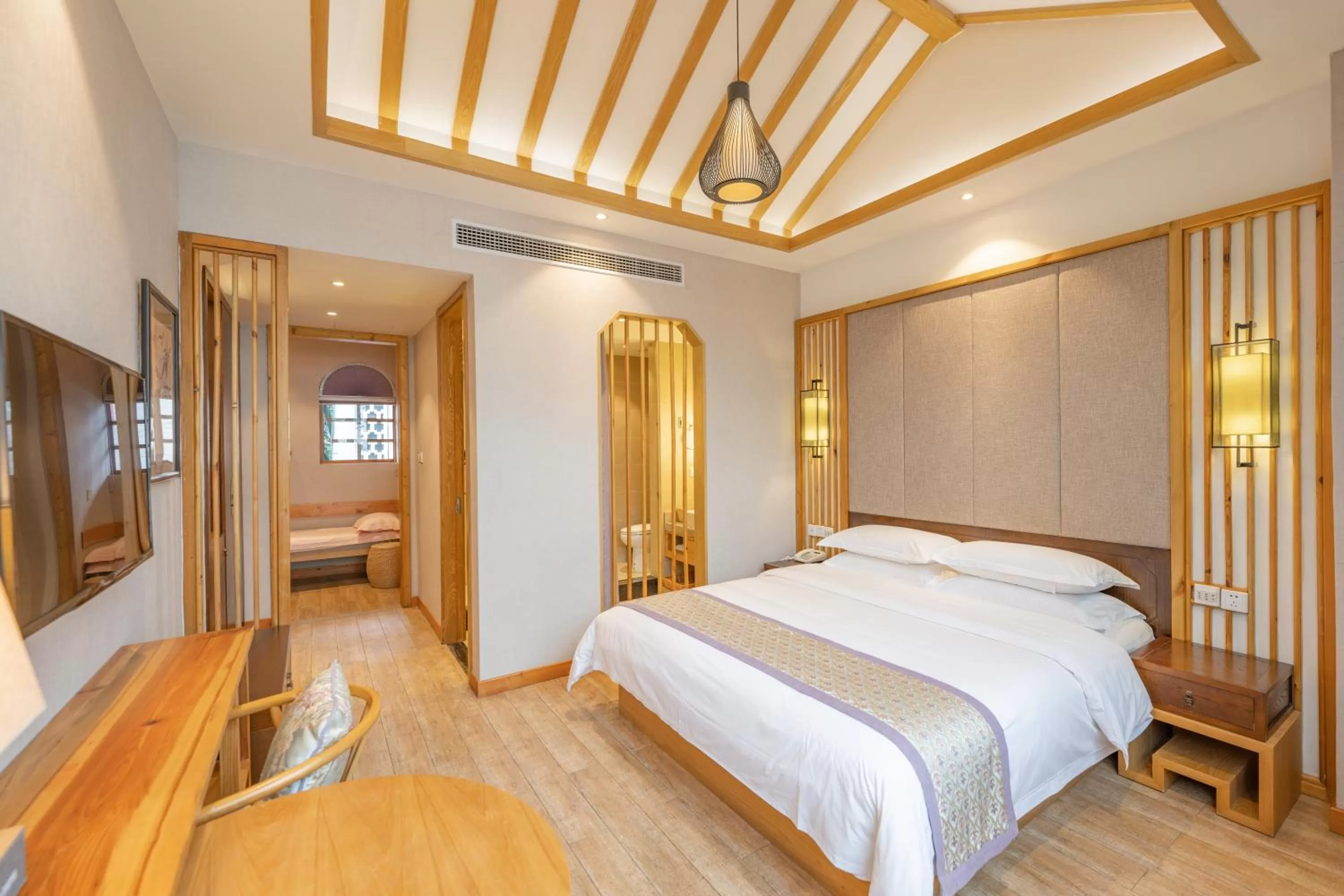 Bed in Mild Spring Boutique Hotel