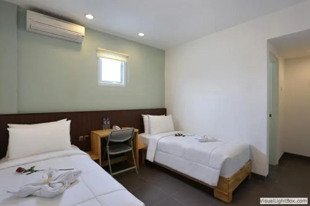 Bed in Duo Legian Hotel