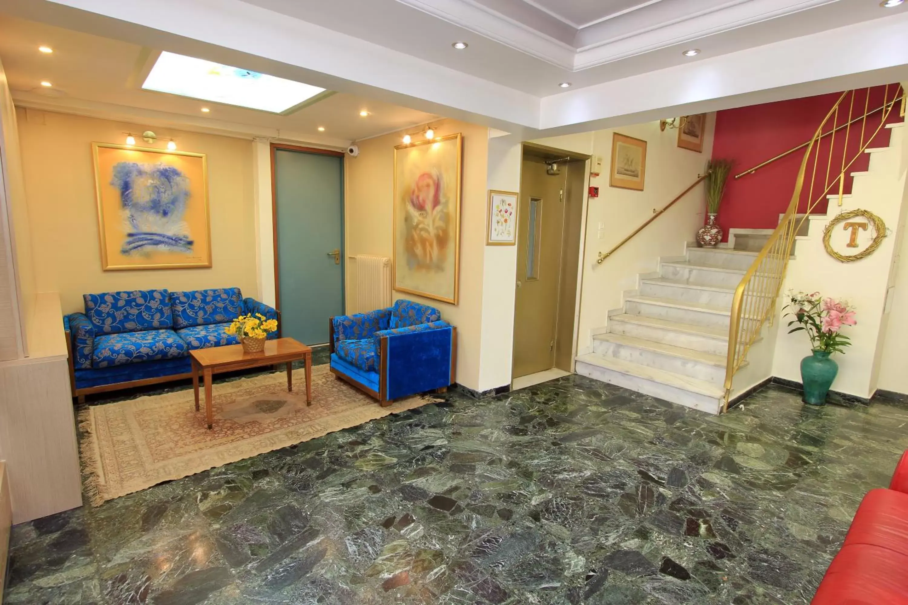 Lobby or reception in Triton Hotel Piraeus