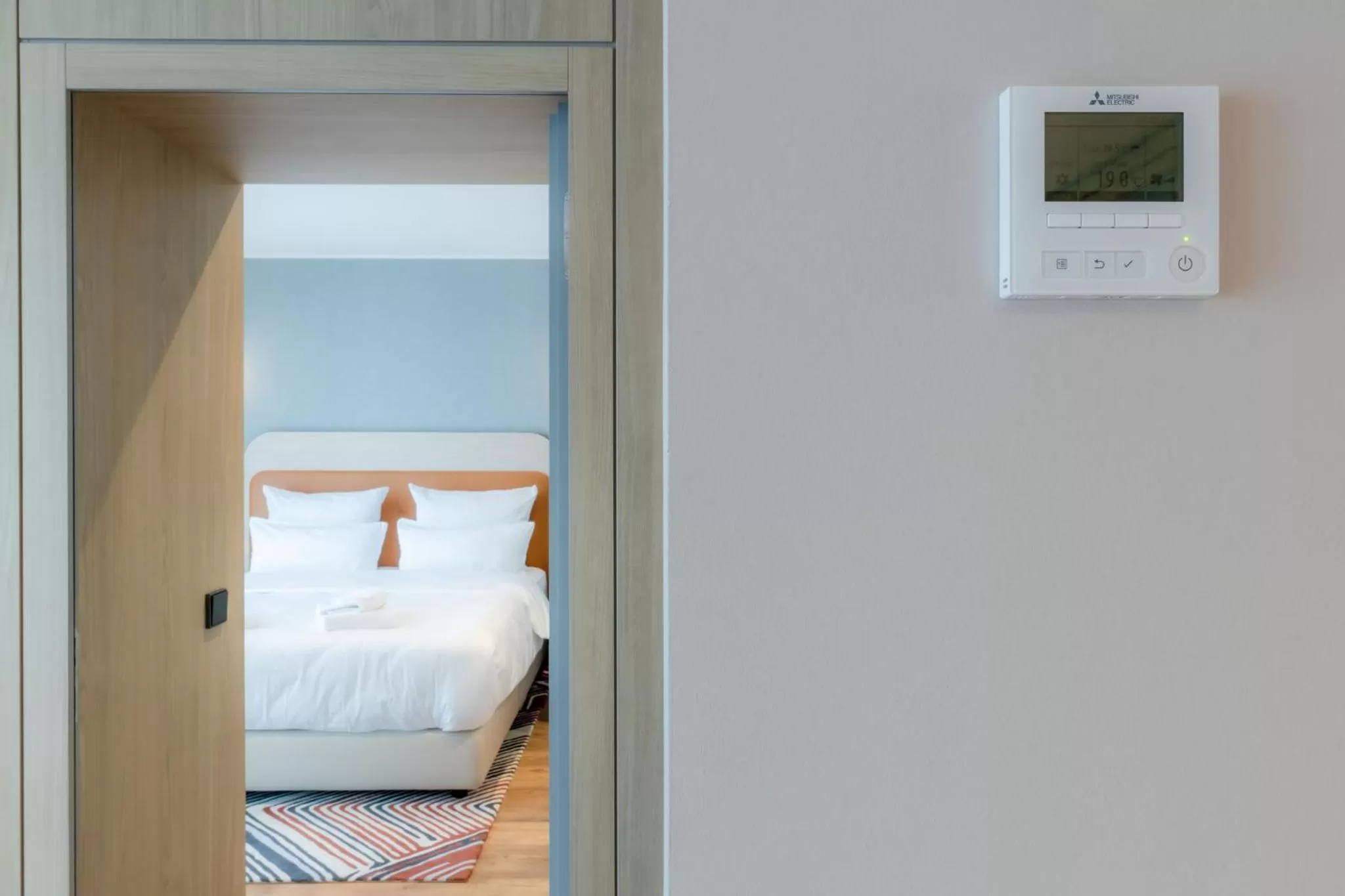 air conditioner, Bed in Fourty Three Luxury Serviced Apartments